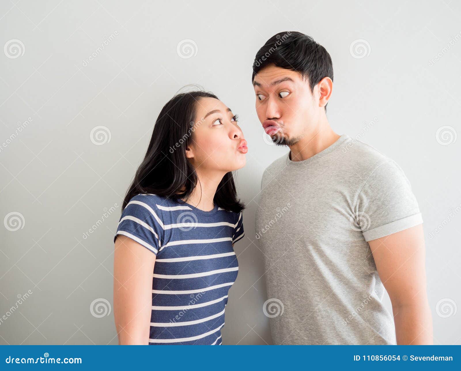 Funny Lovely Couple Trying To Kiss Each Other. Concept of Comedy Stock  Photo - Image of concept, happy: 110856054