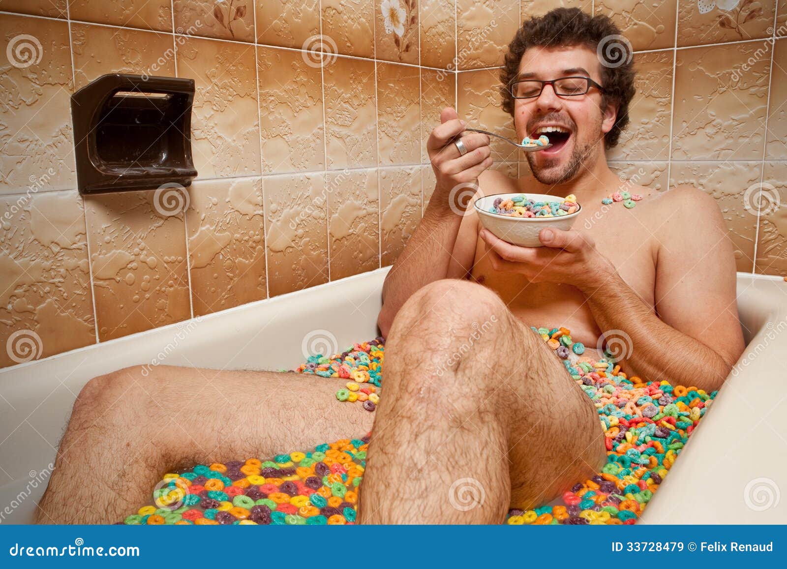 funny man eating his cereals in the bath