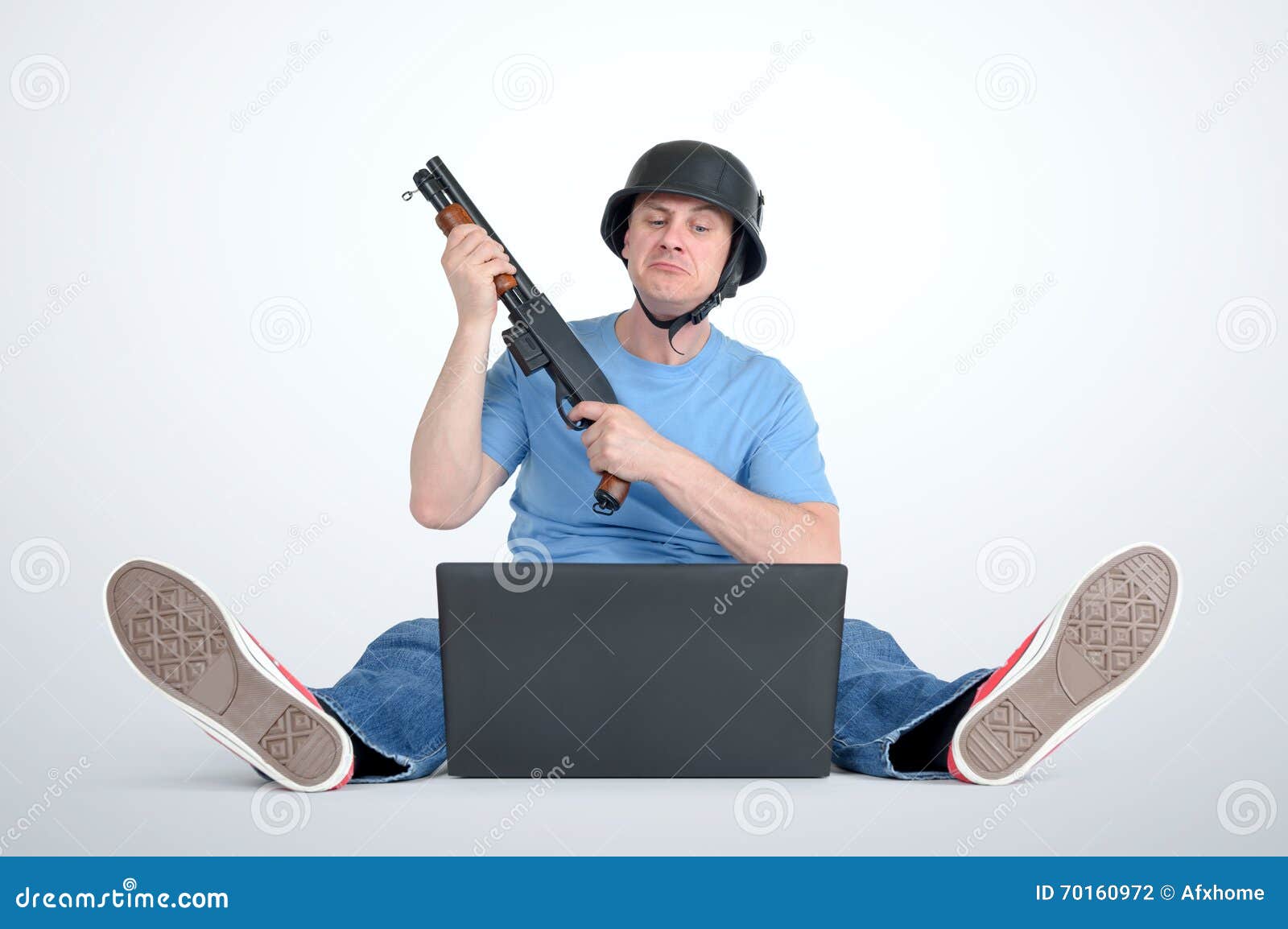 Funny Man in Helmet with Shotgun Sitting on the Floor in Front of a Laptop Stock Photo - Image of addicted, play: 70160972 Funny Man in Helmet with Shotgun Sitting on the Floor in Front of a Laptop Stock Photo - Image of addicted, play: 70160972