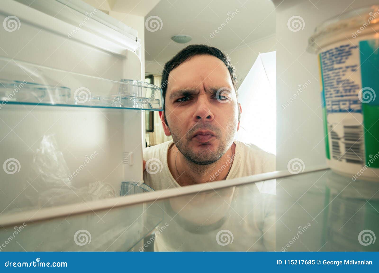 Man Looking into the Fridge Stock Image Image of drink, adult 115217685