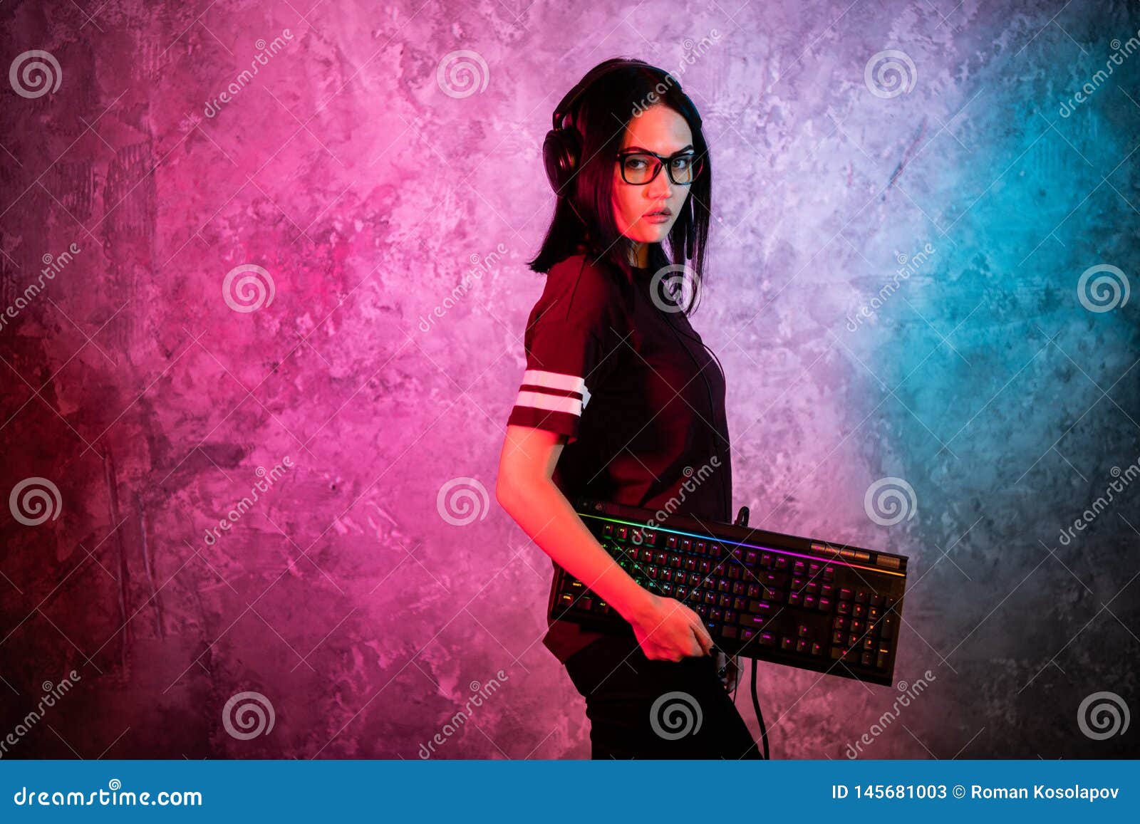 Funny Nerd Gamer Girl Posing With Gaming Keyboard Playing Computer