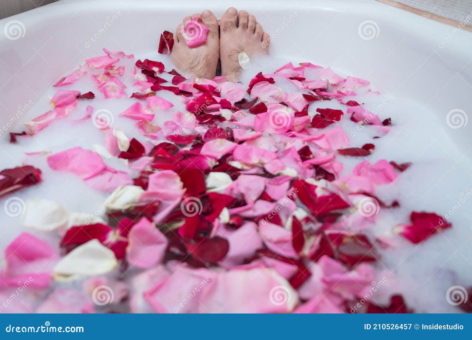 Funny Picture of a Man Taking a Relaxing Bath. Close-up of Male Feet in a  Bath with Foam and Rose Petals Stock Image - Image of petals, male:  210526457