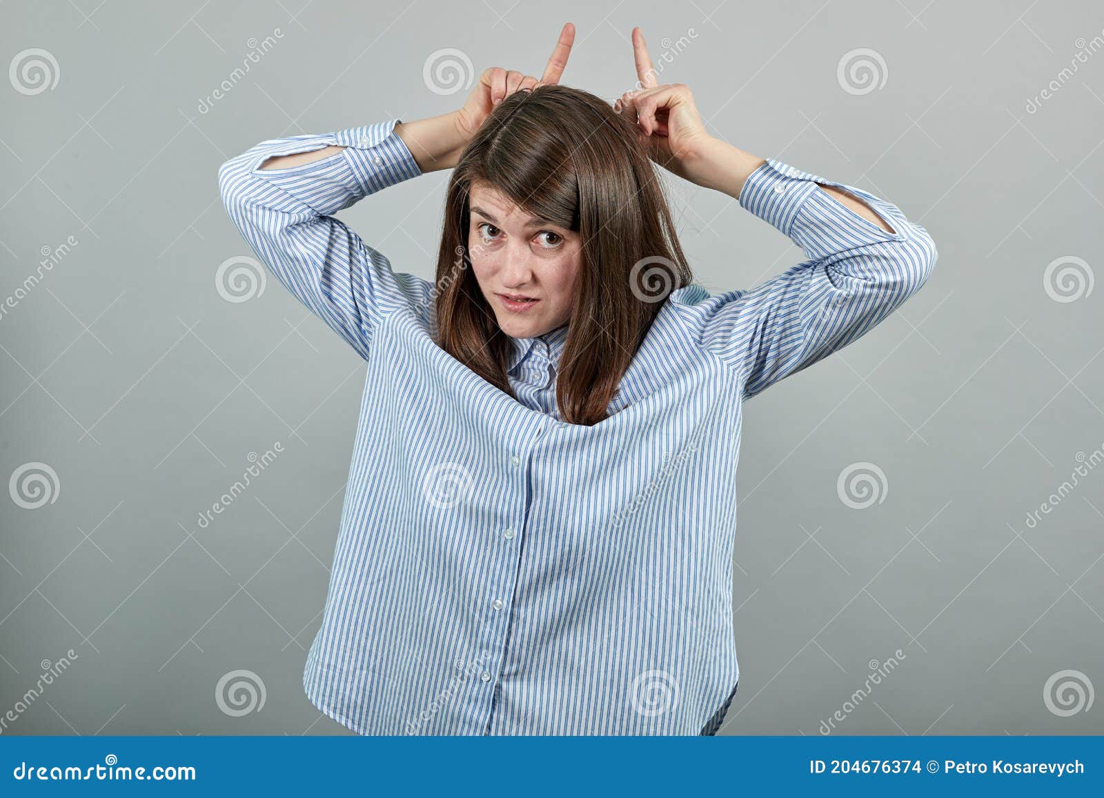 Funny Portrait. Emotional Face. Cheerful Young Shows Horns with Hands on Head Stock Photo - Image of background, hair: 204676374 Funny Portrait. Emotional Face. Cheerful Young Shows Horns with Hands on Head Stock Photo - Image of background, hair: 204676374