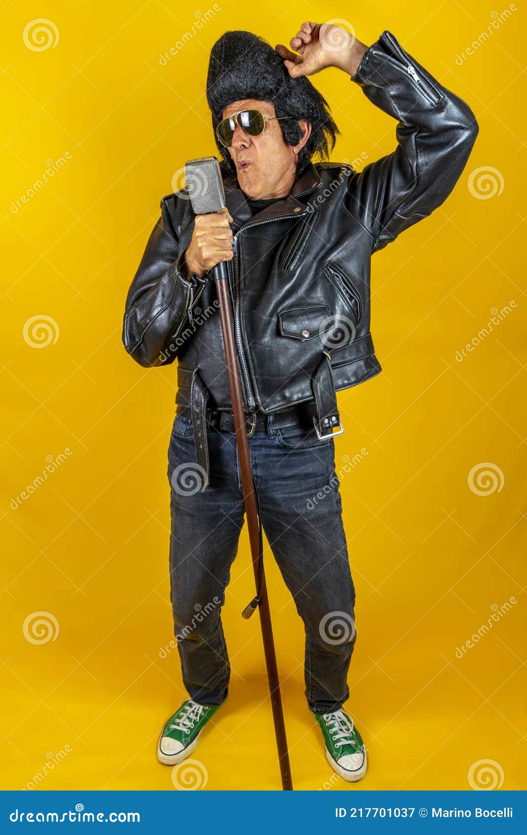 Funny Portrait of Mature Rocker. an Old Singer Dressed in Rockabilly Style  in Action Stock Image - Image of background, musician: 217701037
