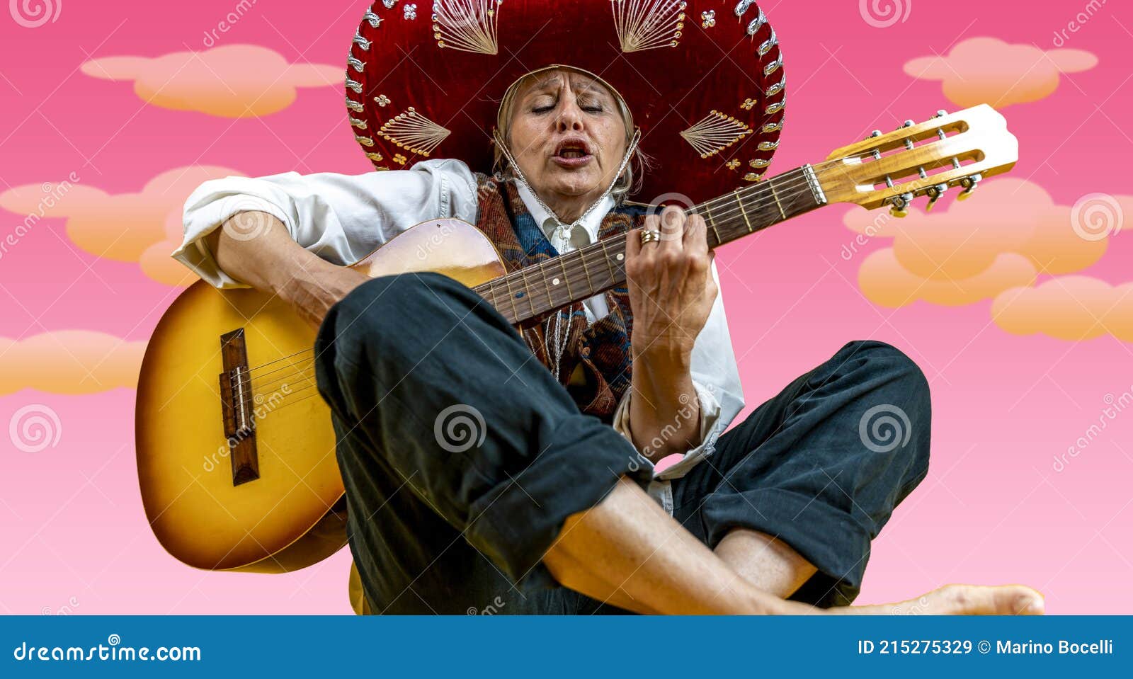 Funny Portrait Of Mature Woman A Lady Playing The Guitar Dressed As A Mexican Mariachi Stock 