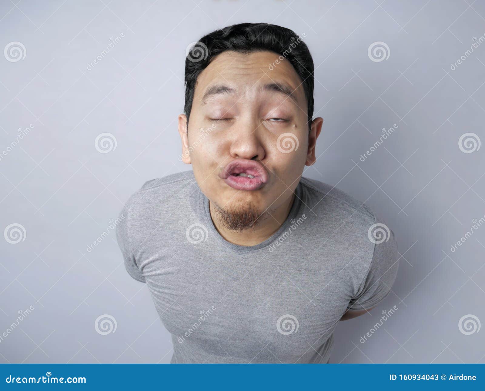 Funny Silly Asian Man Trying To Kiss Stock Image - Image of cute, funny:  160934043