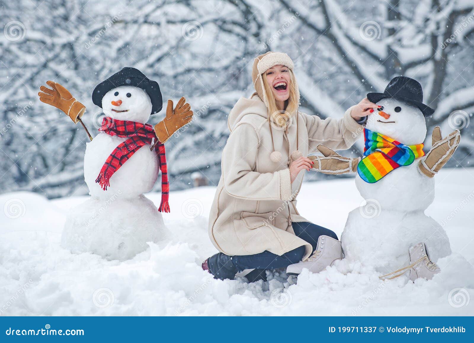 Funny Snowmen. Happy Smiling Girl Make Snowman on Sunny Winter Day ...
