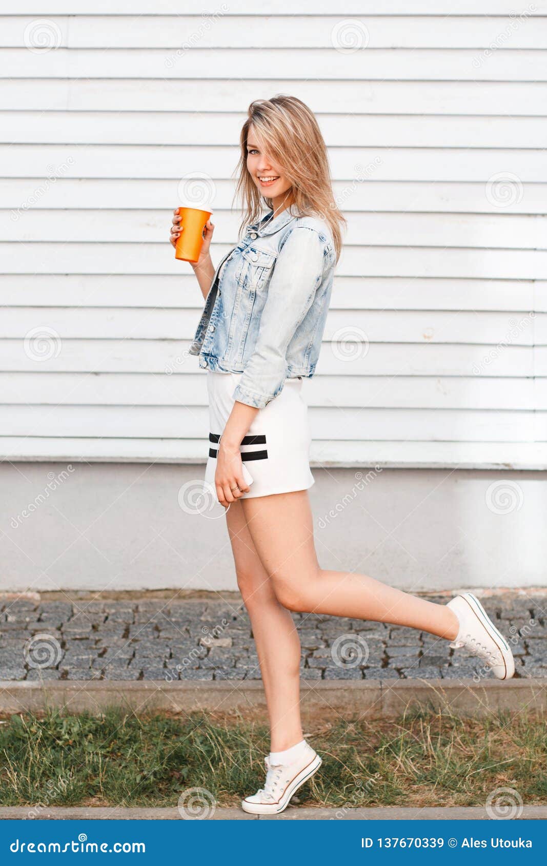 Funny Stylish Young Woman in Trendy Sports Dress in Blue Denim Jacket ...