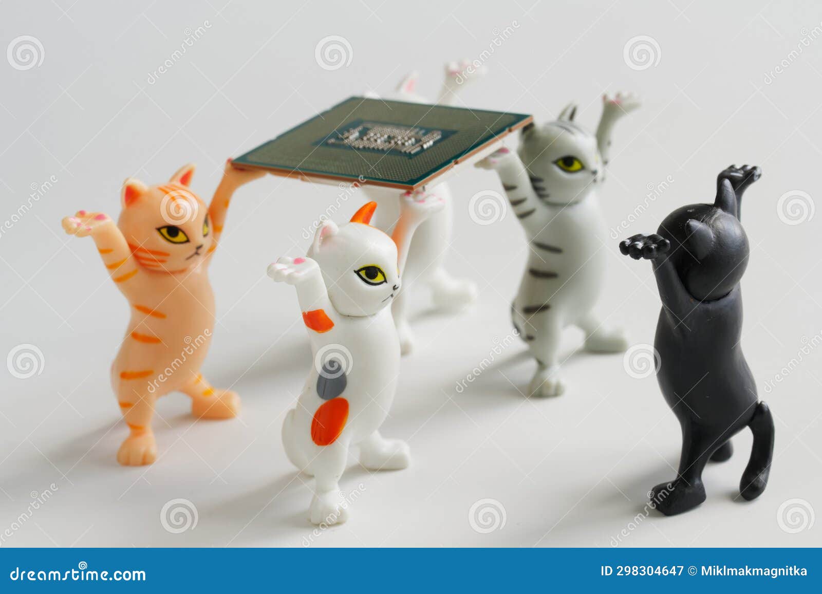 funny toy kittens have raised a modern powerful computer processor. assembling, overclocking and upgrading a computer. delivery of