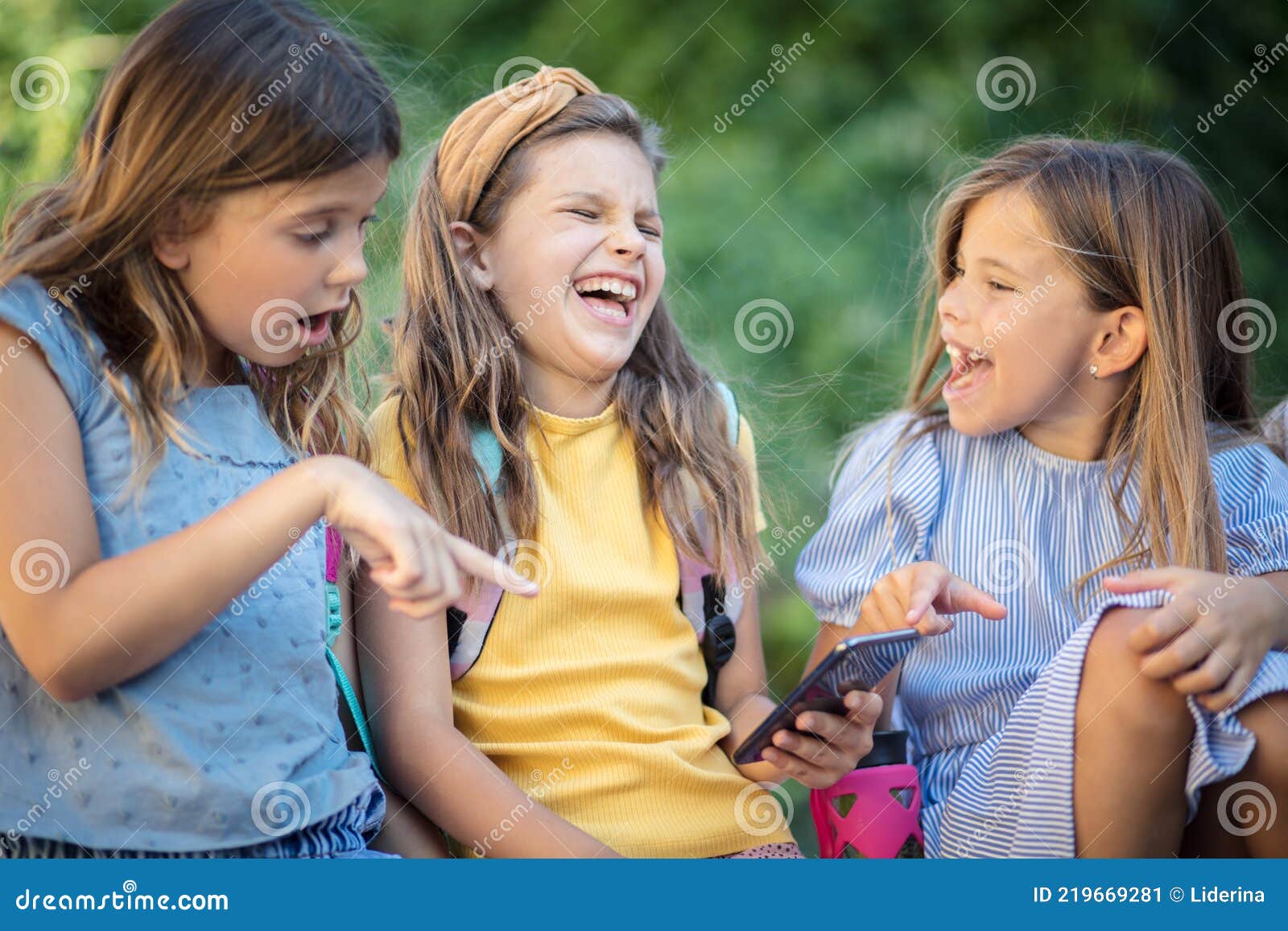 Funny Video. Three Little Girls Playing Outside Stock Image - Image of  ethnicity, nature: 219669281