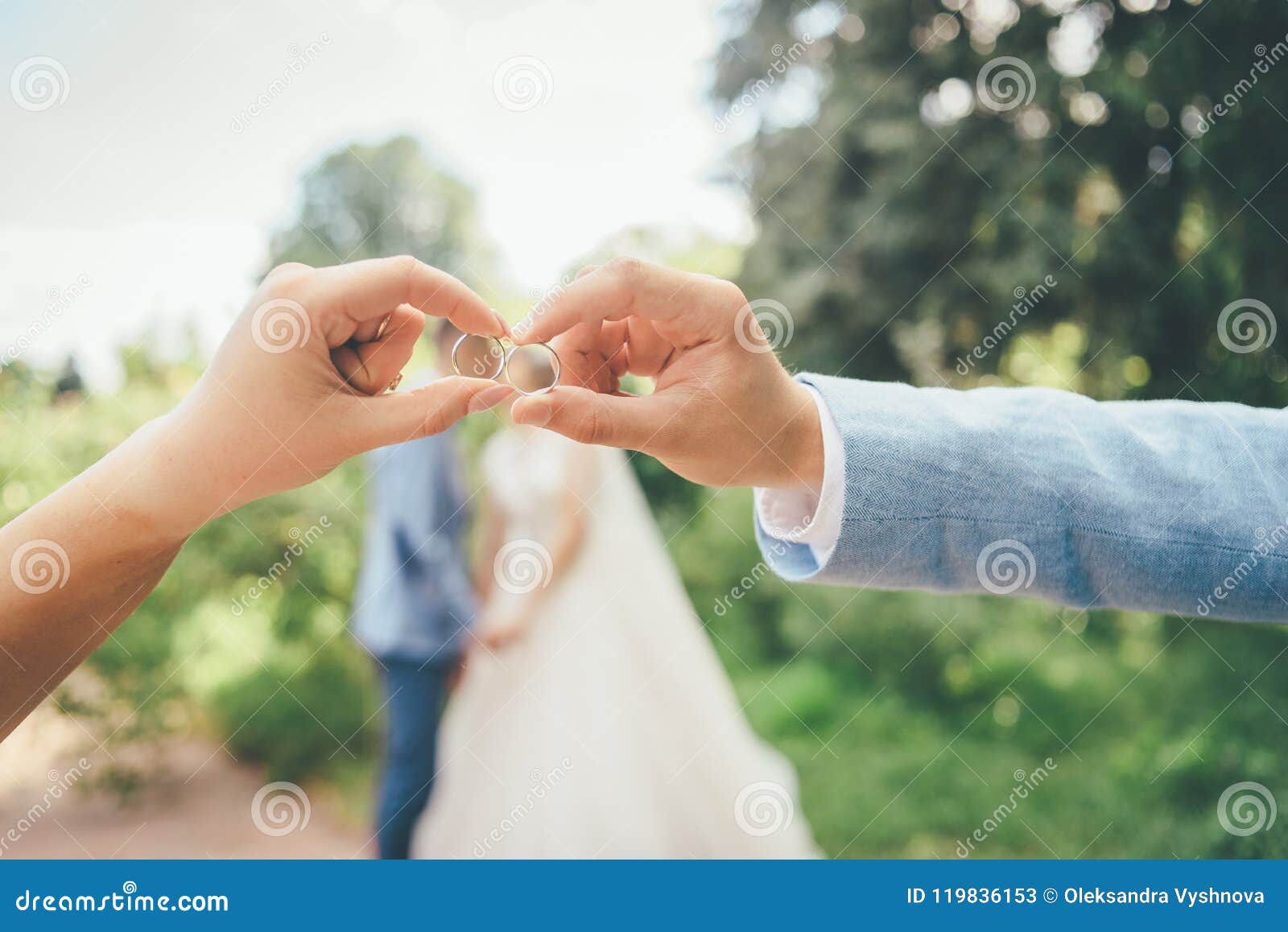 Funny Wedding Photo With Newlyweds And Rings Stock Image
