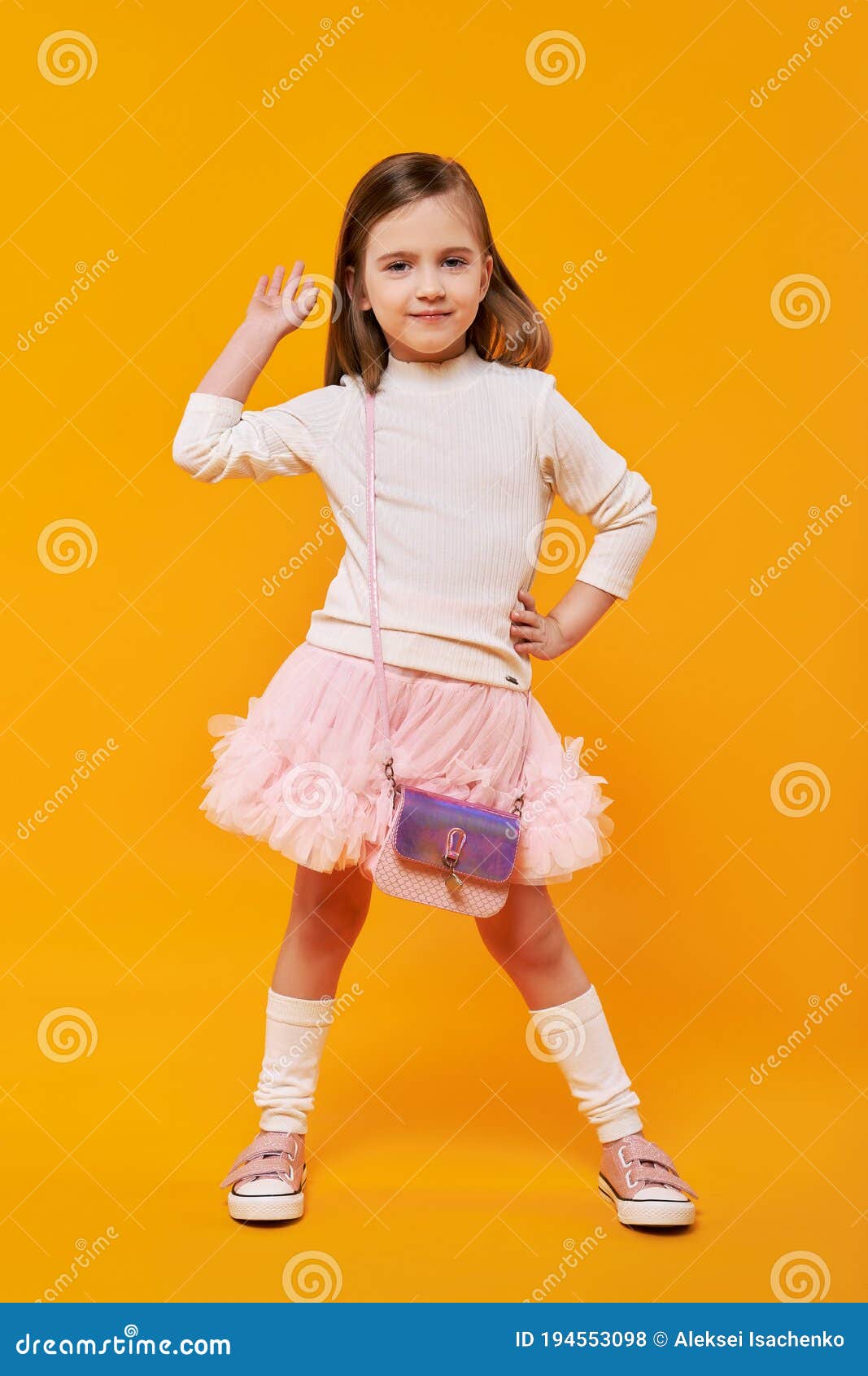 Funny Young Girl Raising Her Hand in High Five Gesture Stock Photo ...