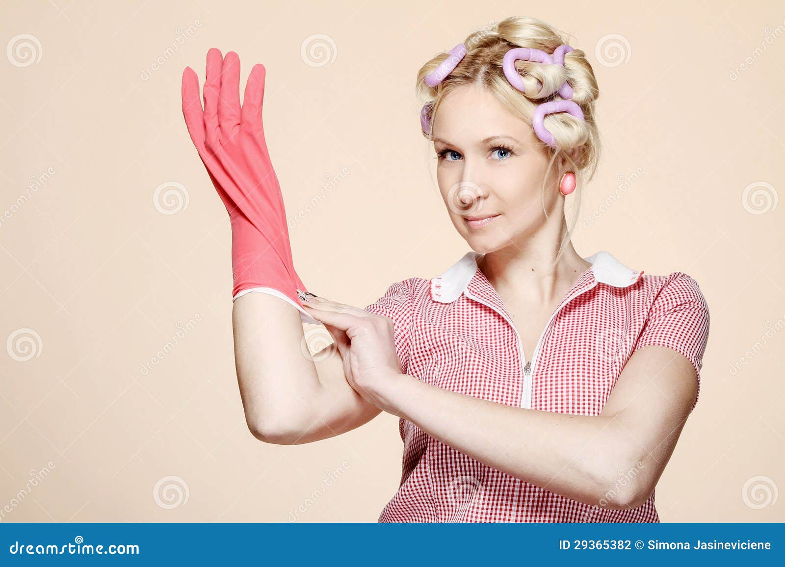 Funny Young Housewife With Gloves Stock Photography 