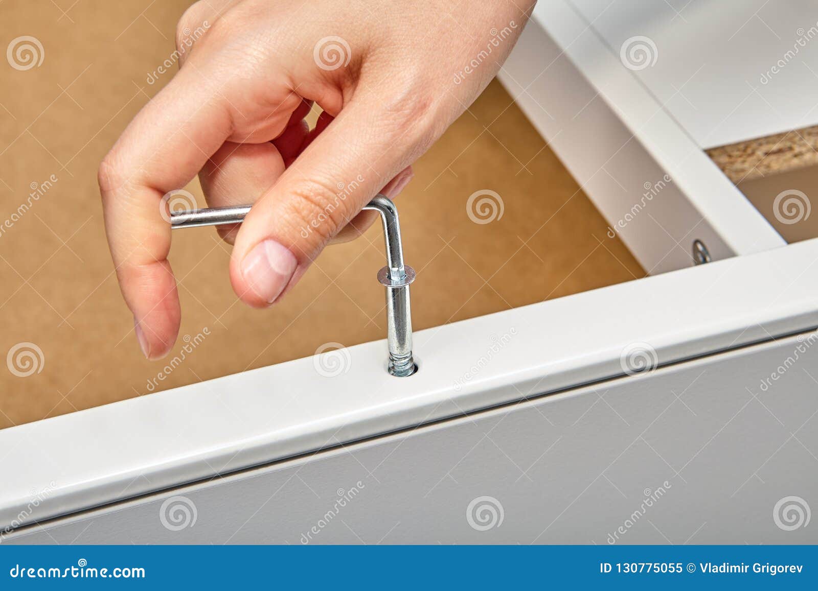 Furniture Assembler Tightens Cam Bolt Fixing into Furniture. Stock Image Image of installing