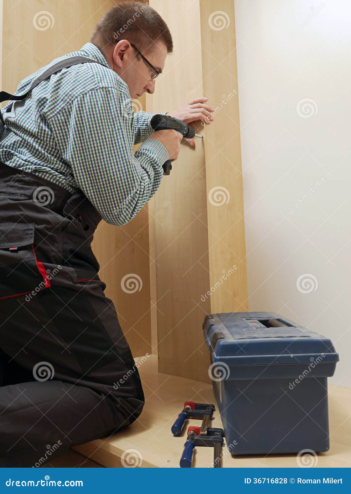 Furniture assembling stock photo. Image of male, working 36716828