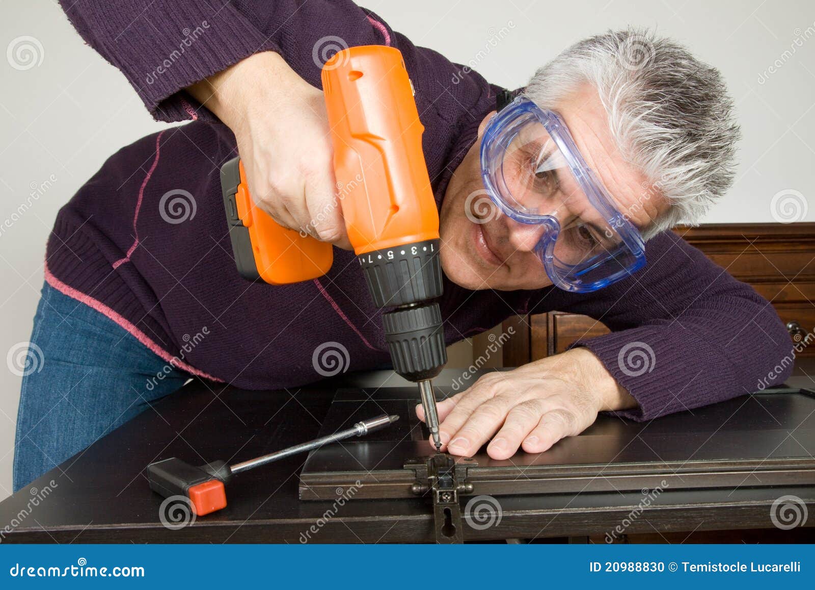 Furniture fitter stock photo. Image of hand, handyman 20988830