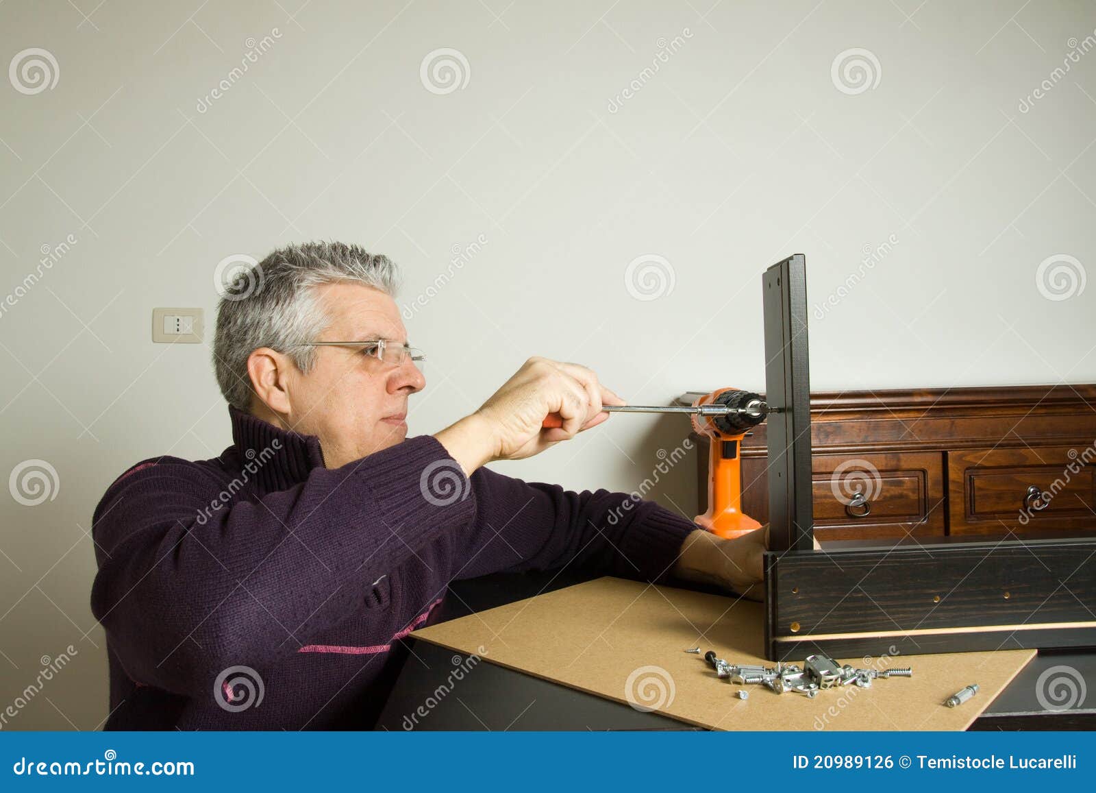 Furniture fitter stock photo. Image of hand, instrument 20989126