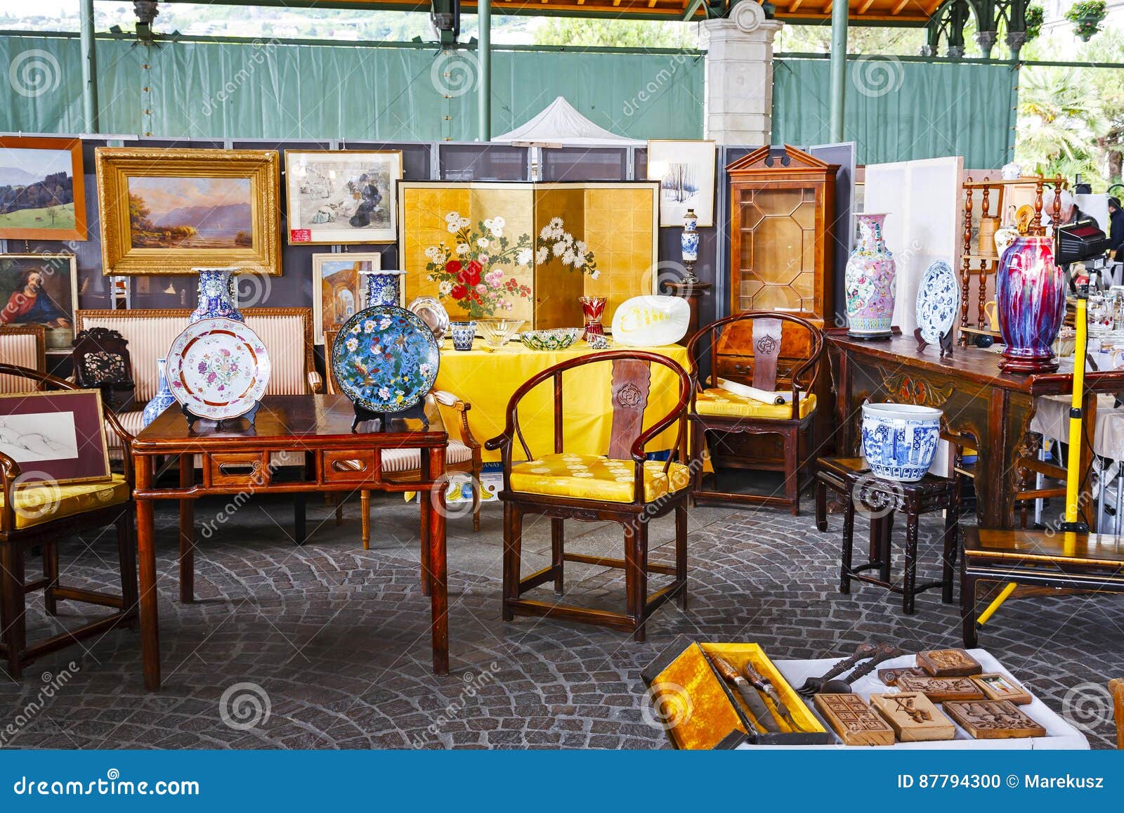 Furniture And Paintings On Sale At Antiques Market Editorial Image