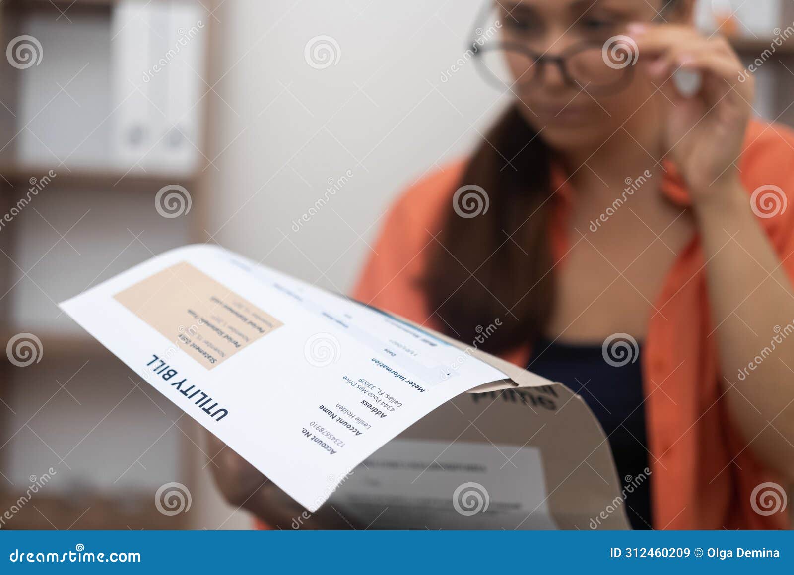 woman over utility bills, mentally crunching numbers mounting electricity, water, and internet bills