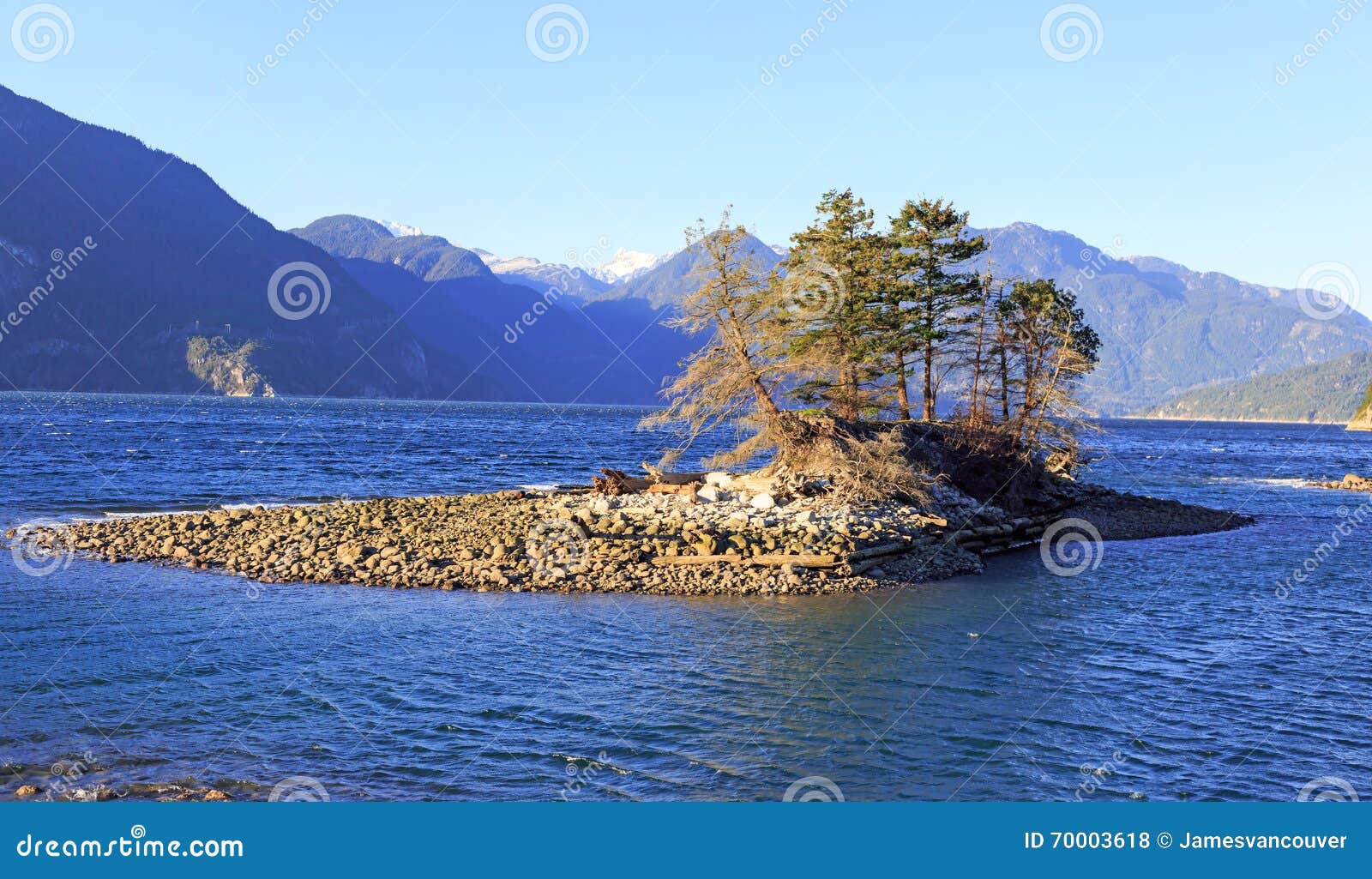 Furry Creek at sunset time stock photo. Image of wave 70003618
