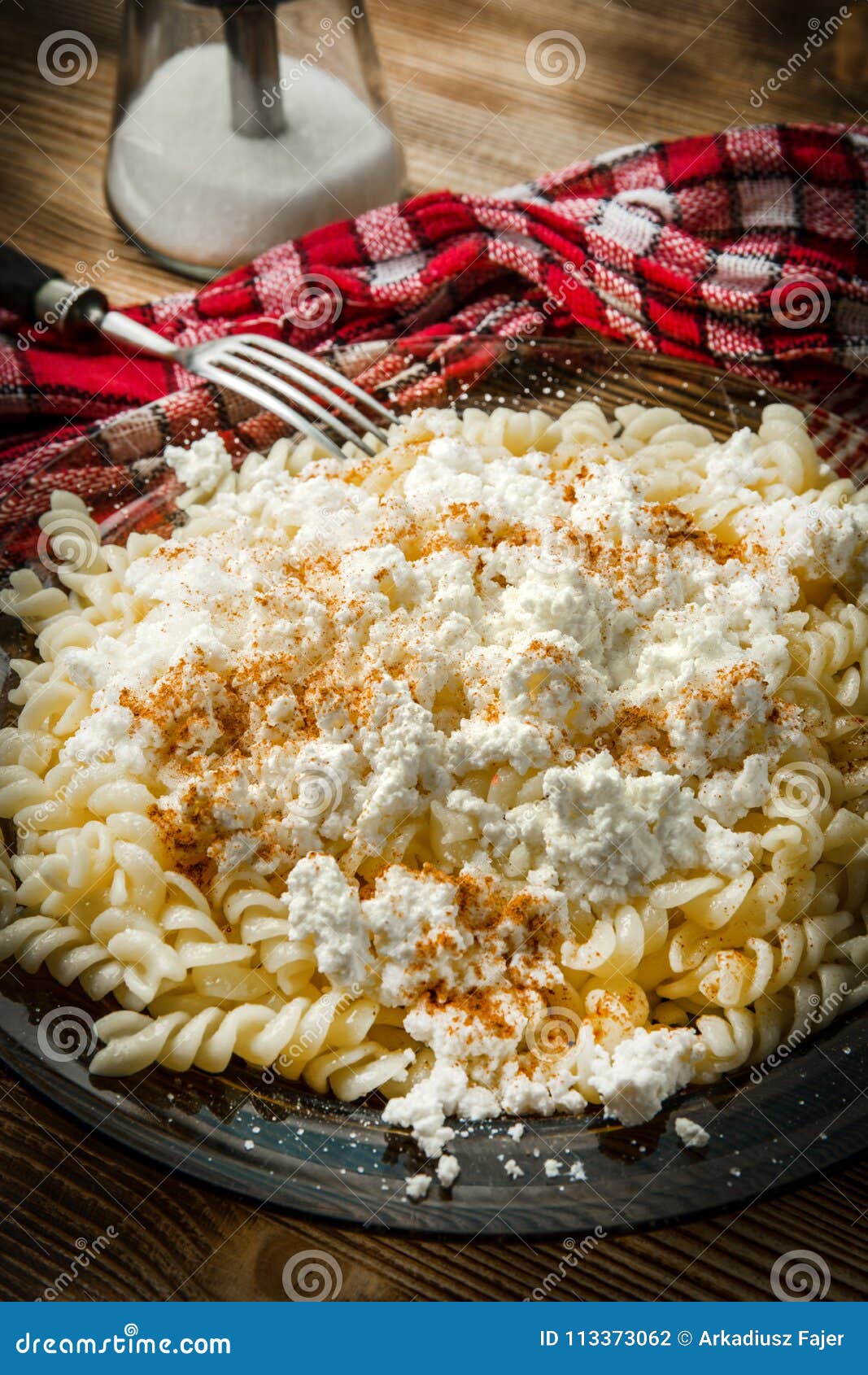 Fusilli Pasta With Cottage Cheese Sugar And Cinnamon Stock Photo