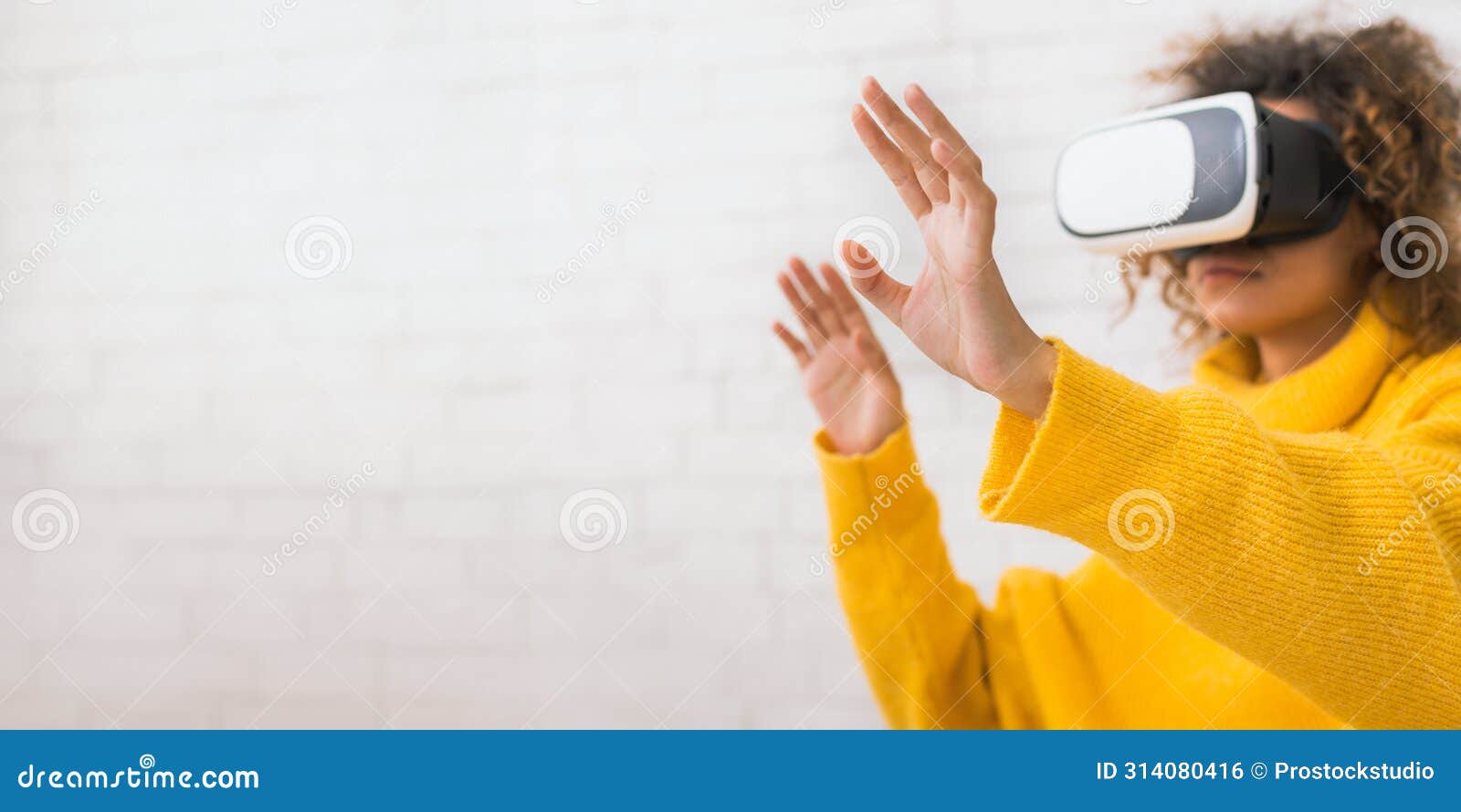 future is now. woman using vr headset and gesticulating
