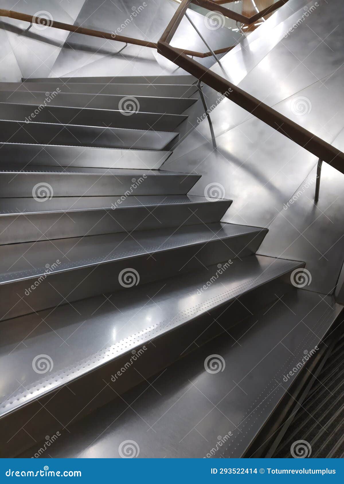 futuristic aluminum stairs, la caixa fundation, madrid