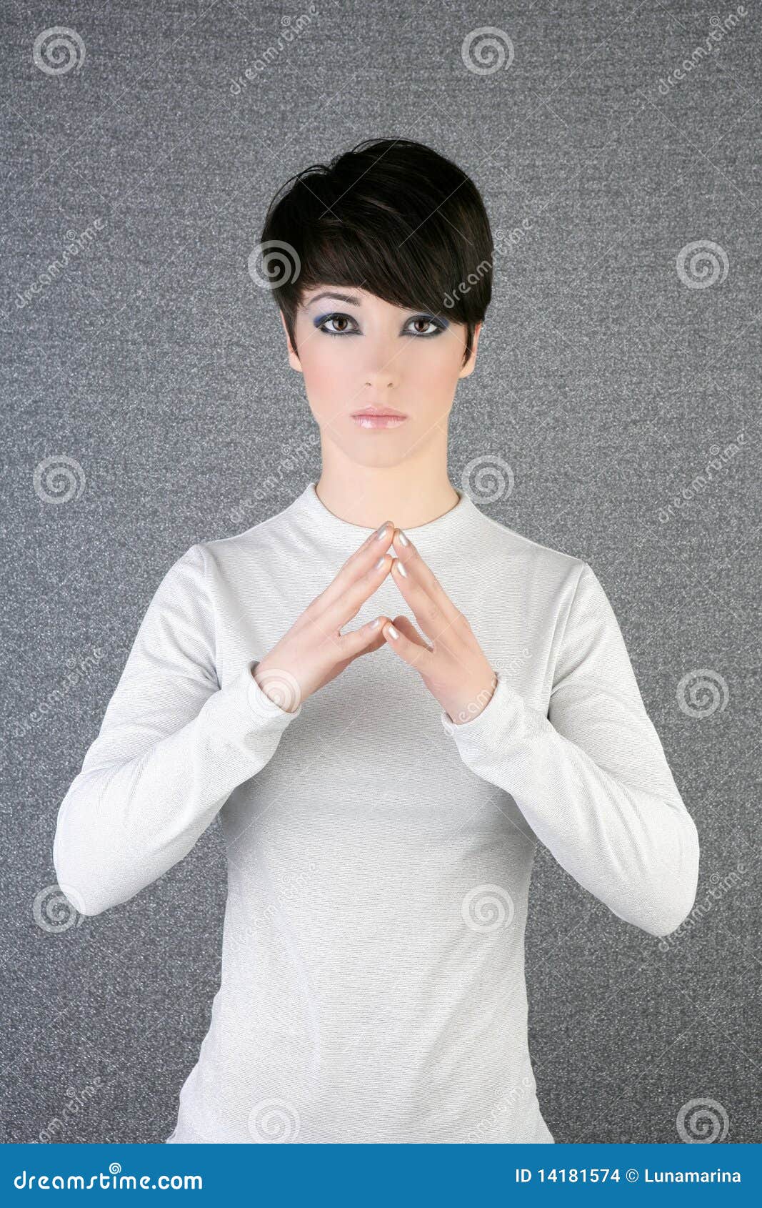 futuristic androgynous brunette woman silver