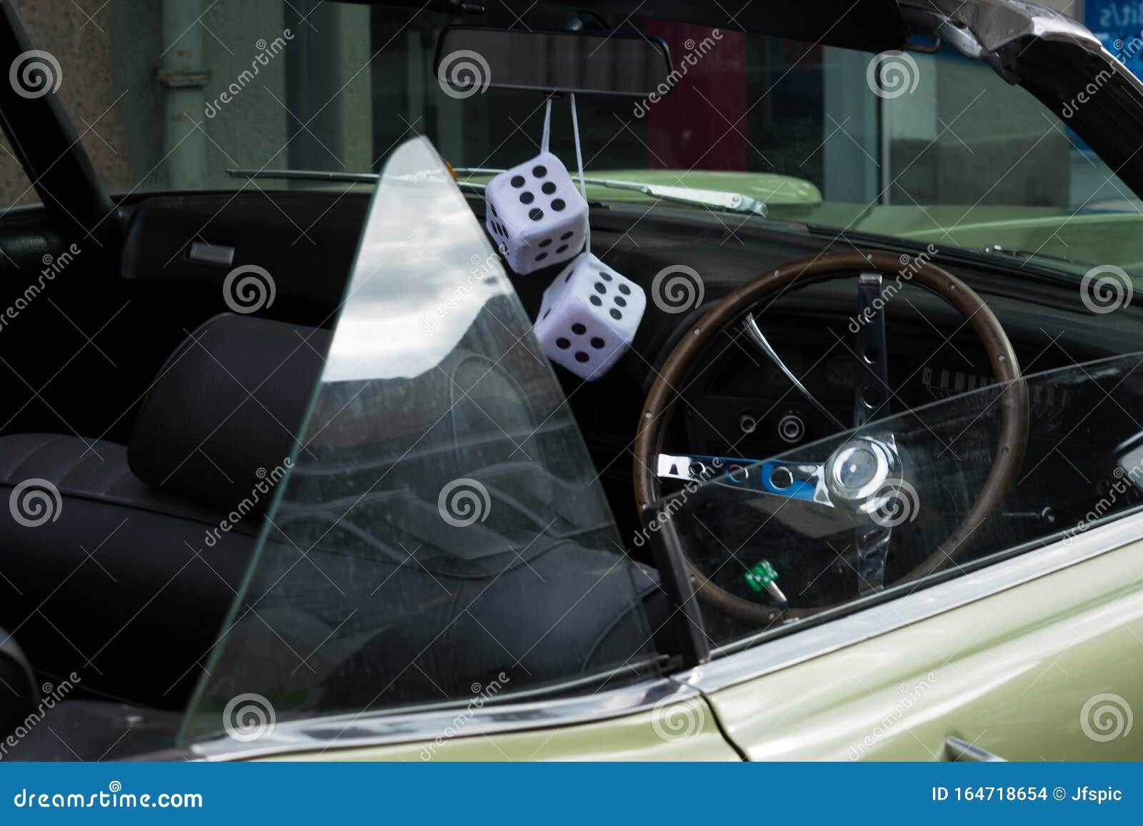 Fuzzy Dice on the Rearview Mirror Stock Photo - Image of