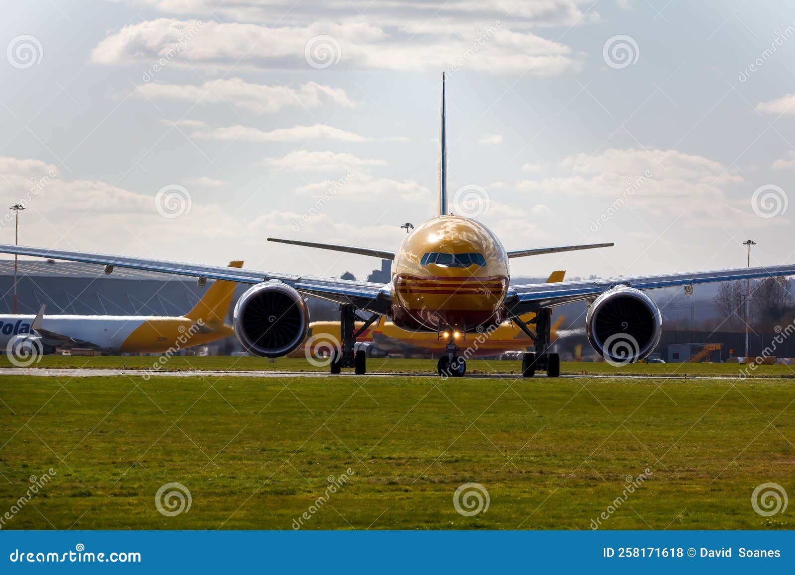g-dhly a 777 taxing out for take off at ema - stock photo.jpg