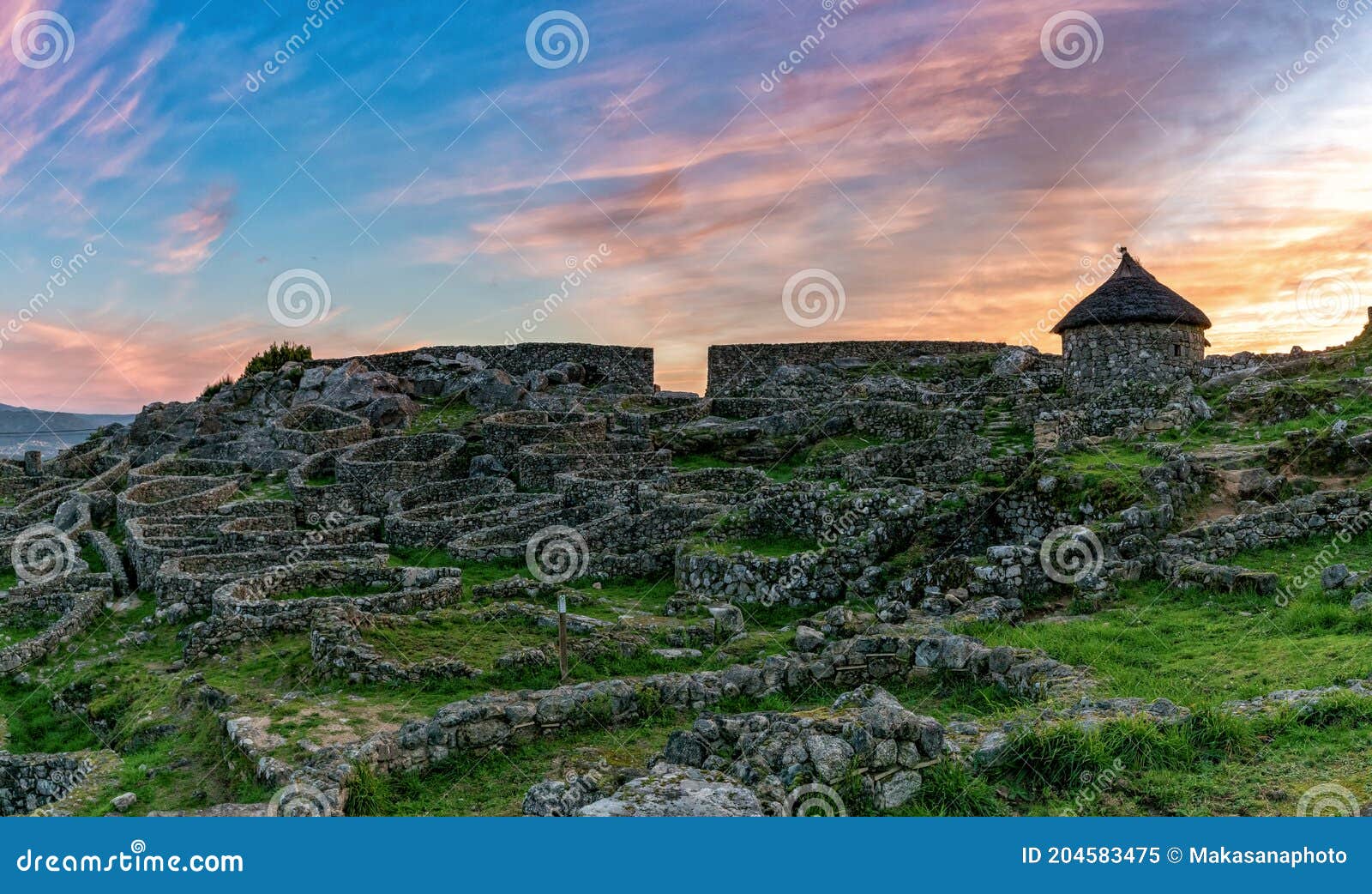 the gaelic ruins at castro de santa tecla in galicia at sunrise