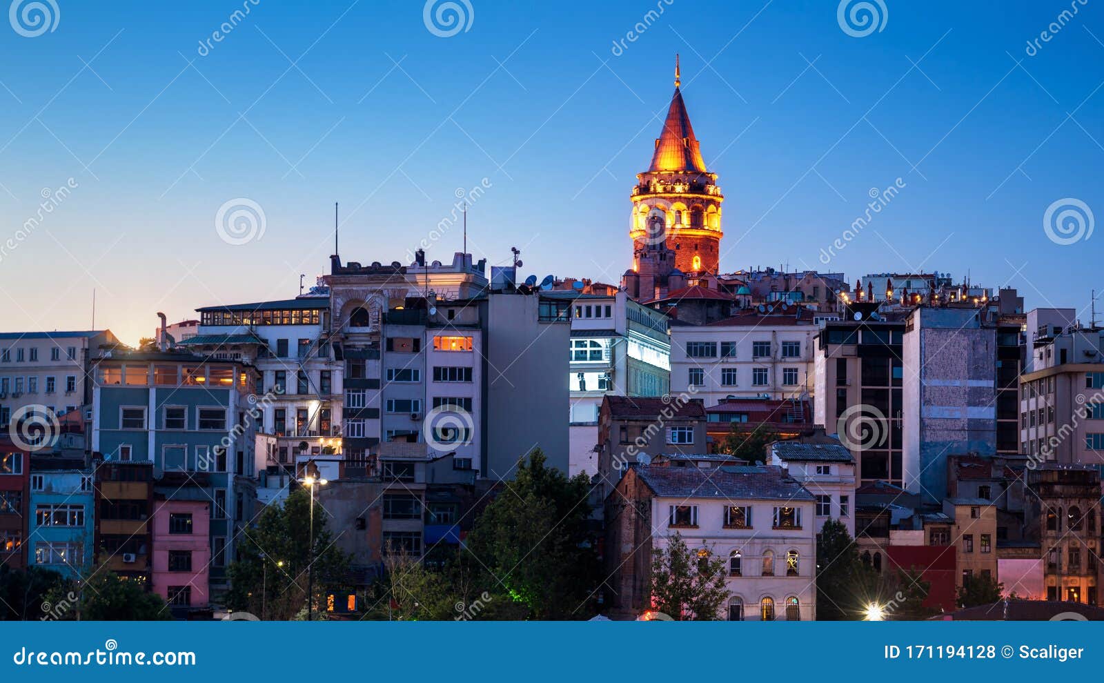 galata tower at night, istanbul, turkey. medieval galata tower is a famous landmark of istanbul city. panorama of beyoglu district