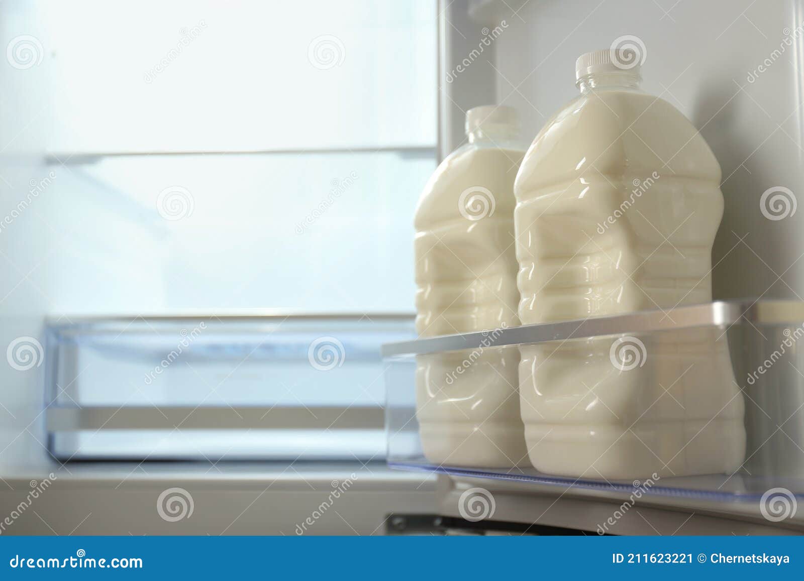 Gallons of Milk in Refrigerator, Closeup. Space for Text Stock Image Image of door, dairy