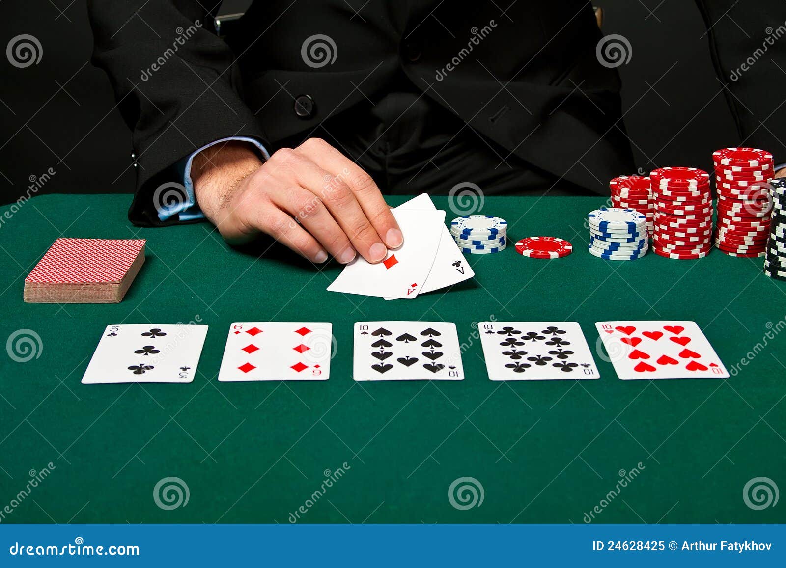gambler with cards and chips.