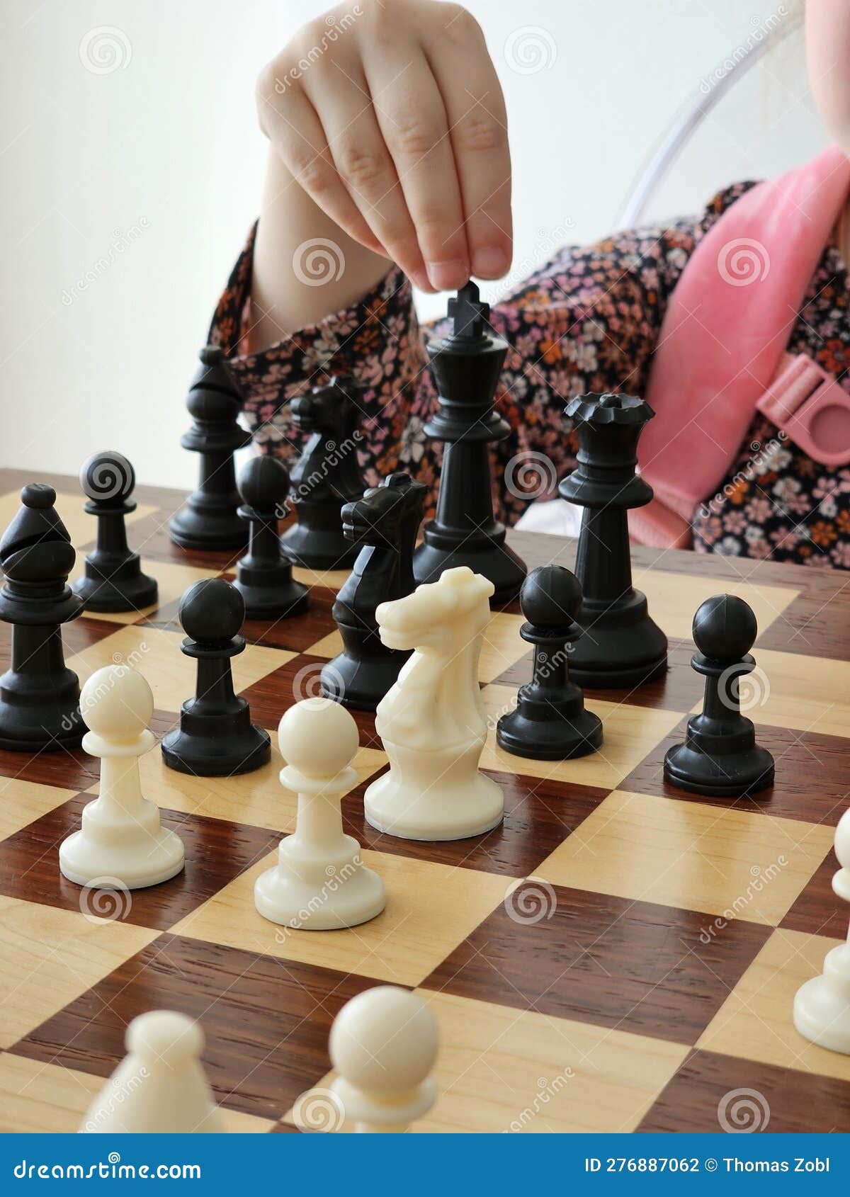A Game on a Chess Board with Black and White Pieces Stock Photo Image