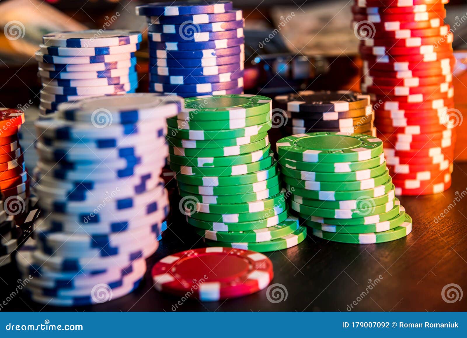 Game and Entertainment Concept Many Different Casino Chips on Play