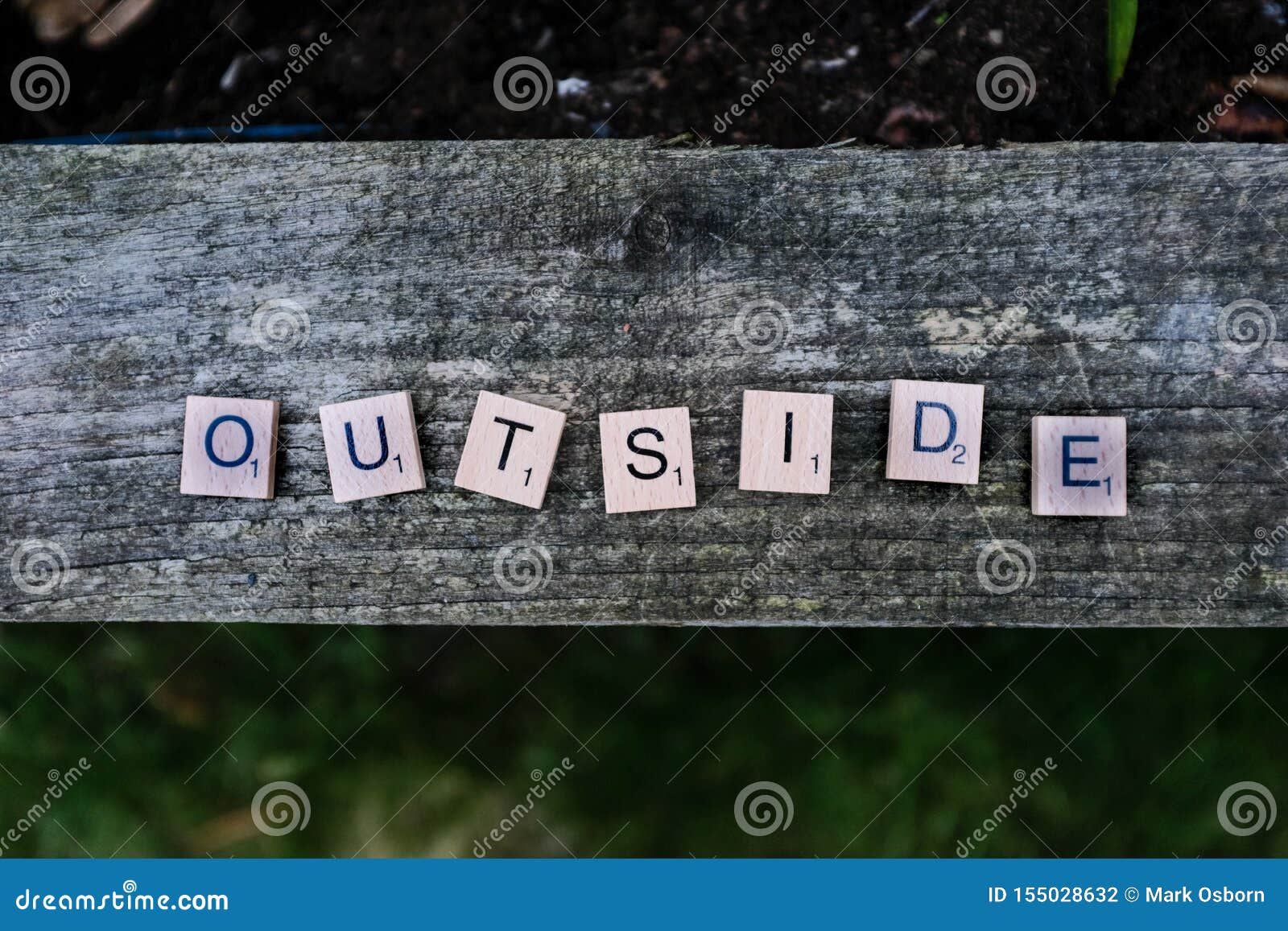 Game Letters Spell The Word Outside On A Wooden Garden Planter