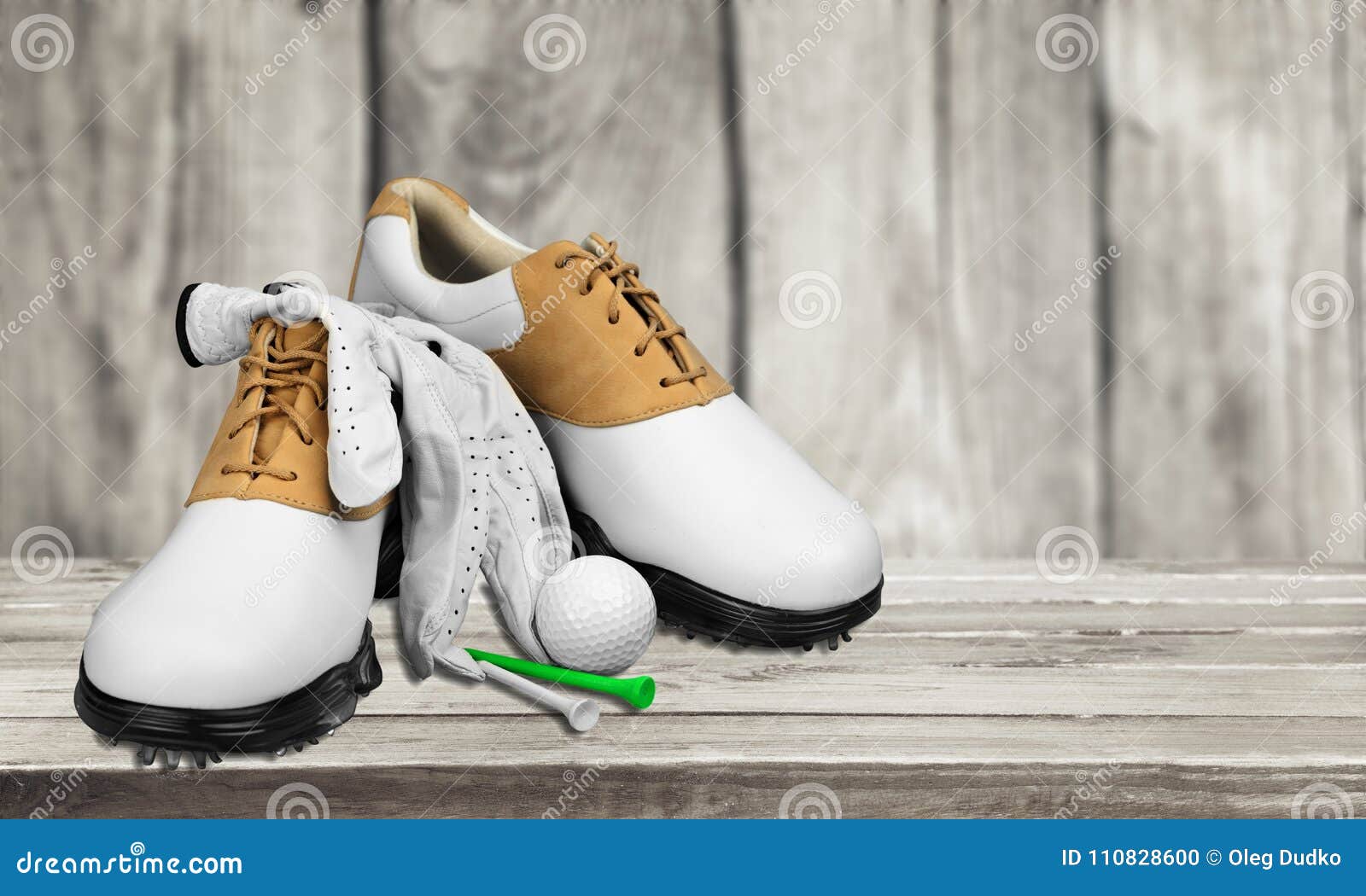 Pair of Golfing Shoes, Ball and Tees on Wooden Stock Photo - Image of ...