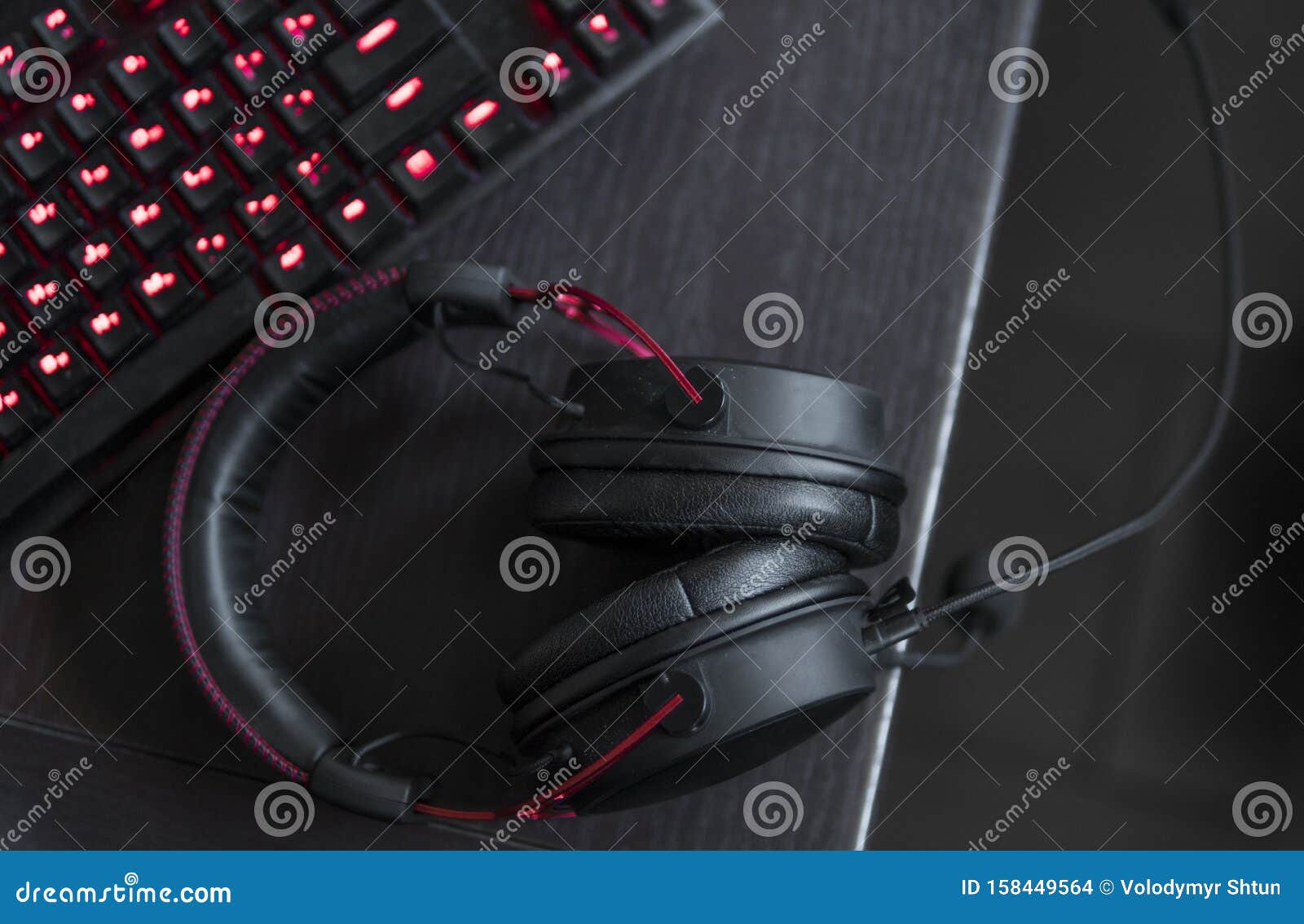 gamer keyboard with colorful blue lights, modern gamer computer. blue backlight, backlit on laptop or keyborad computer