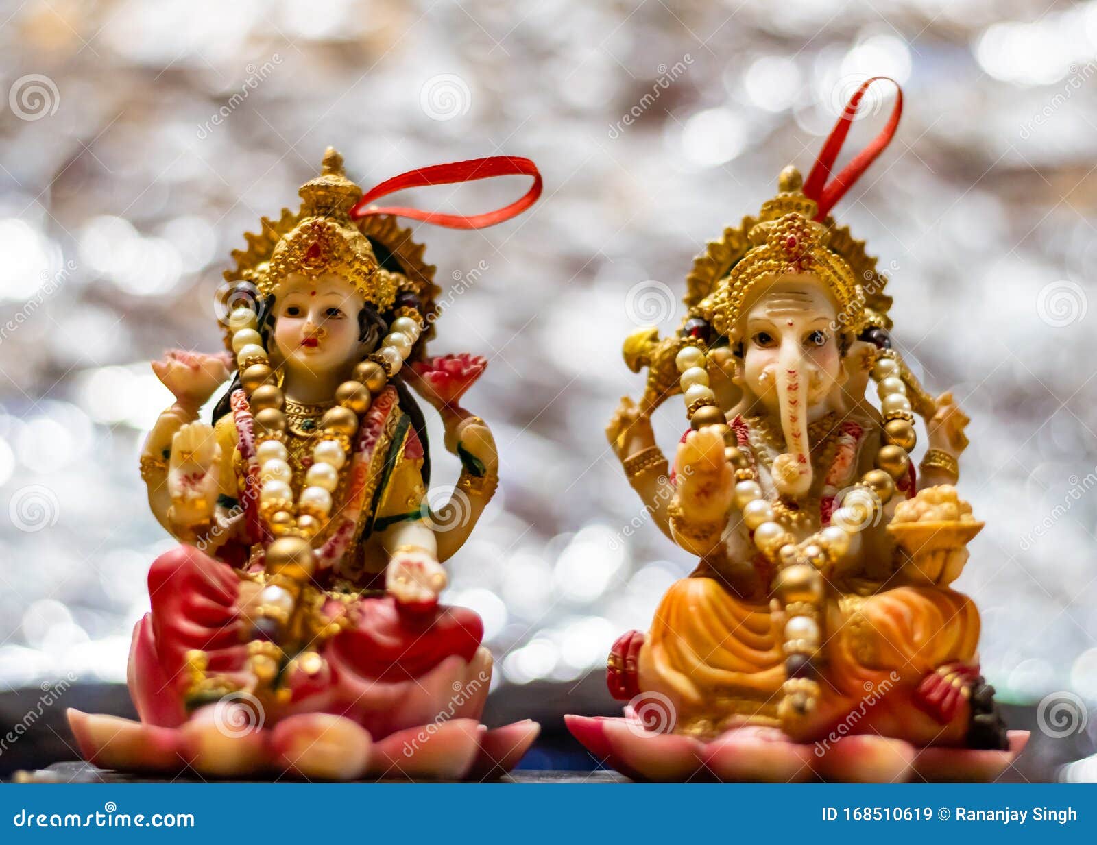 ganesha and luxmi idols in deepawali concept with bokeh background
