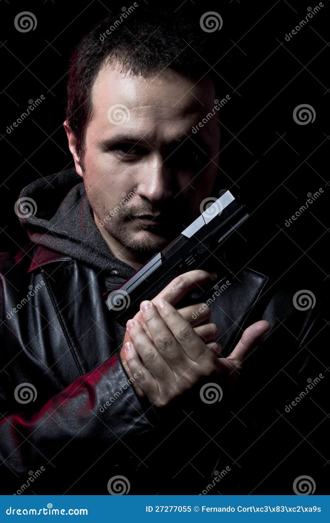 ganster, dangerous man with a gun, shooting