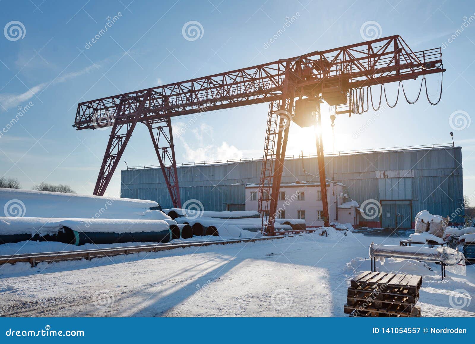 Gantry Crane in the Warehouse Area. Winter Sunny Day Stock Image