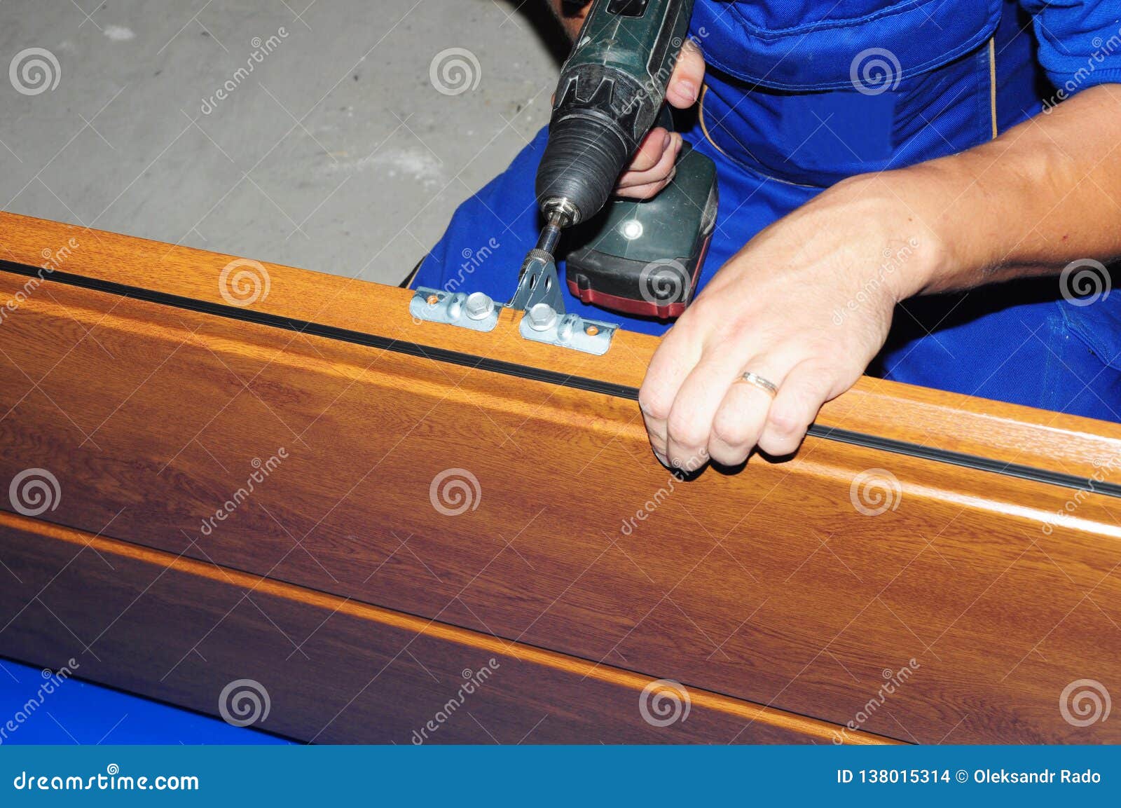 Garage Door Panel. Constractor Repair and Installig Garage Door Board