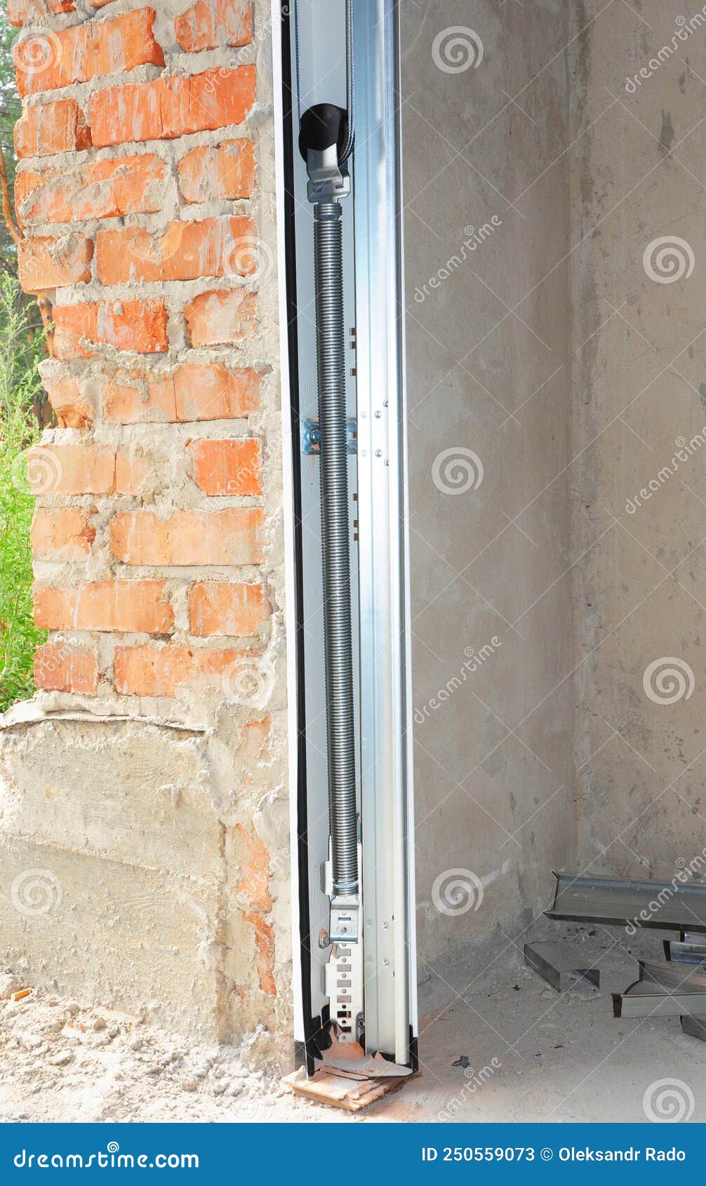 Garage Door Spring Repair. a Closeup of a New Garage Door Spring Installation or Replacement