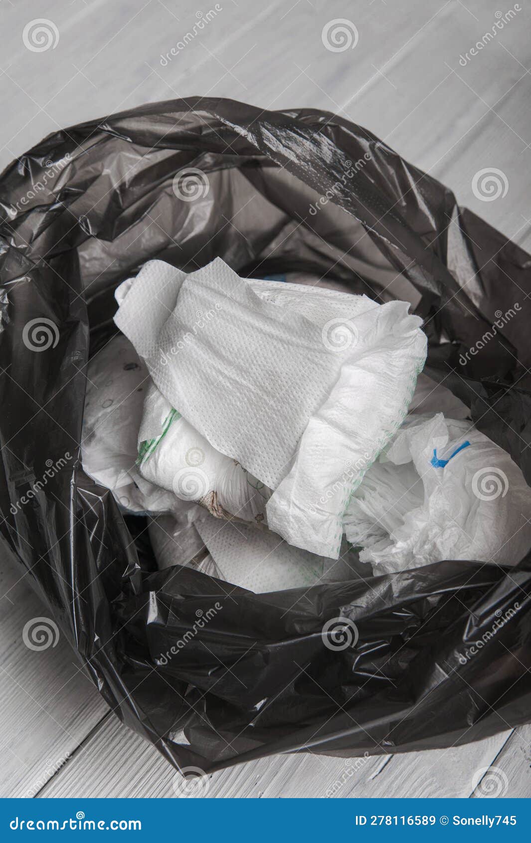 Garbage Bag with Waste, Plastic and Diapers Closeup. Environment