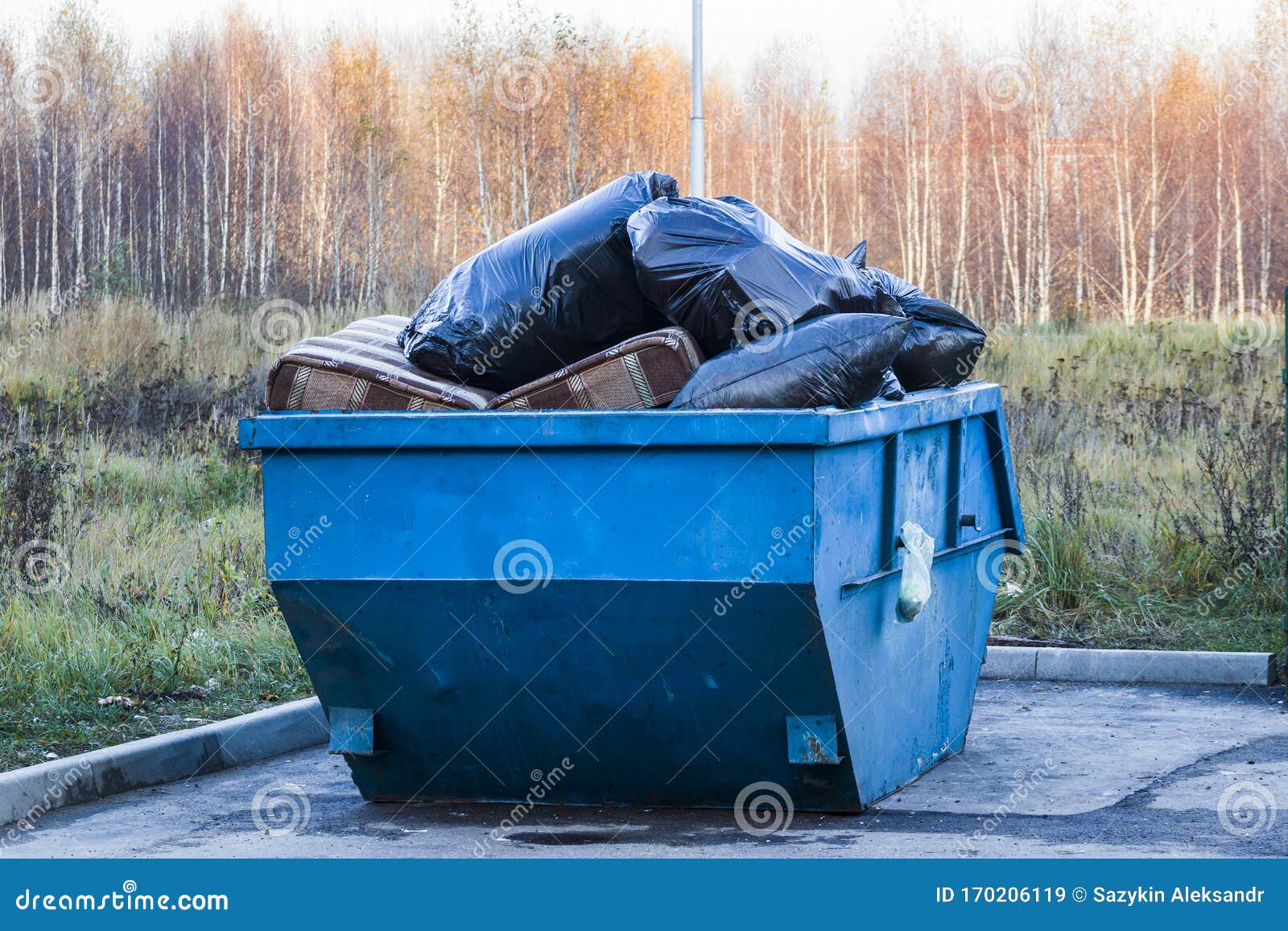 Garbage Containers in Full with Garbage. Garbage Containers Used for Collecting Solid Household
