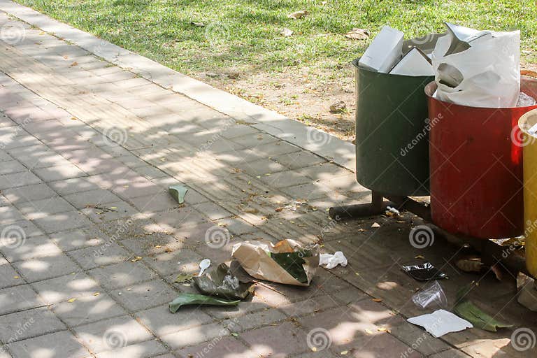 The Garbage that Spills Out of the Trash Cans on the Park Streets Stock Image Image of purple