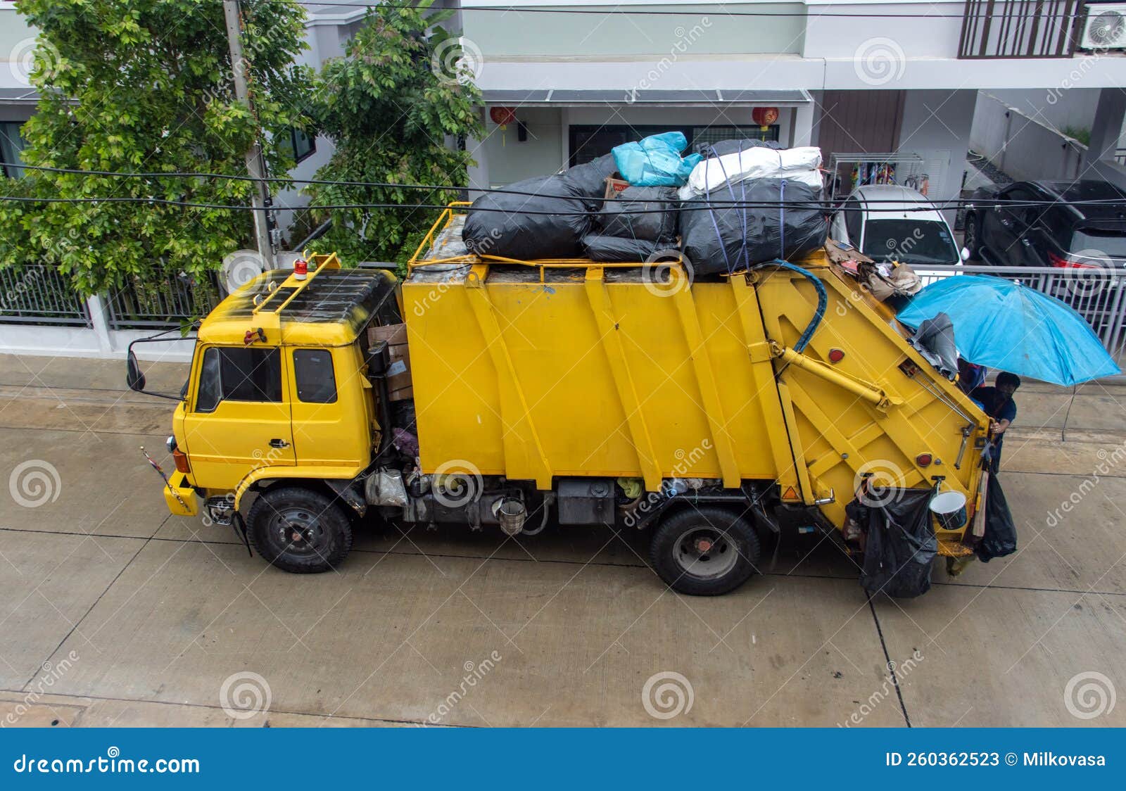A Garbage Truck is Driving on the Street Stock Image Image of dirty