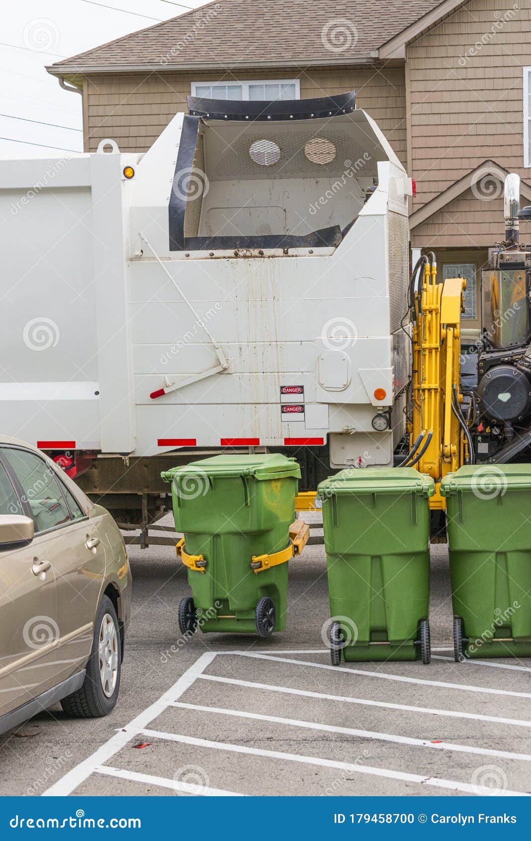 Garbage Truck Grabs Trash Can for Dumping Stock Photo Image of
