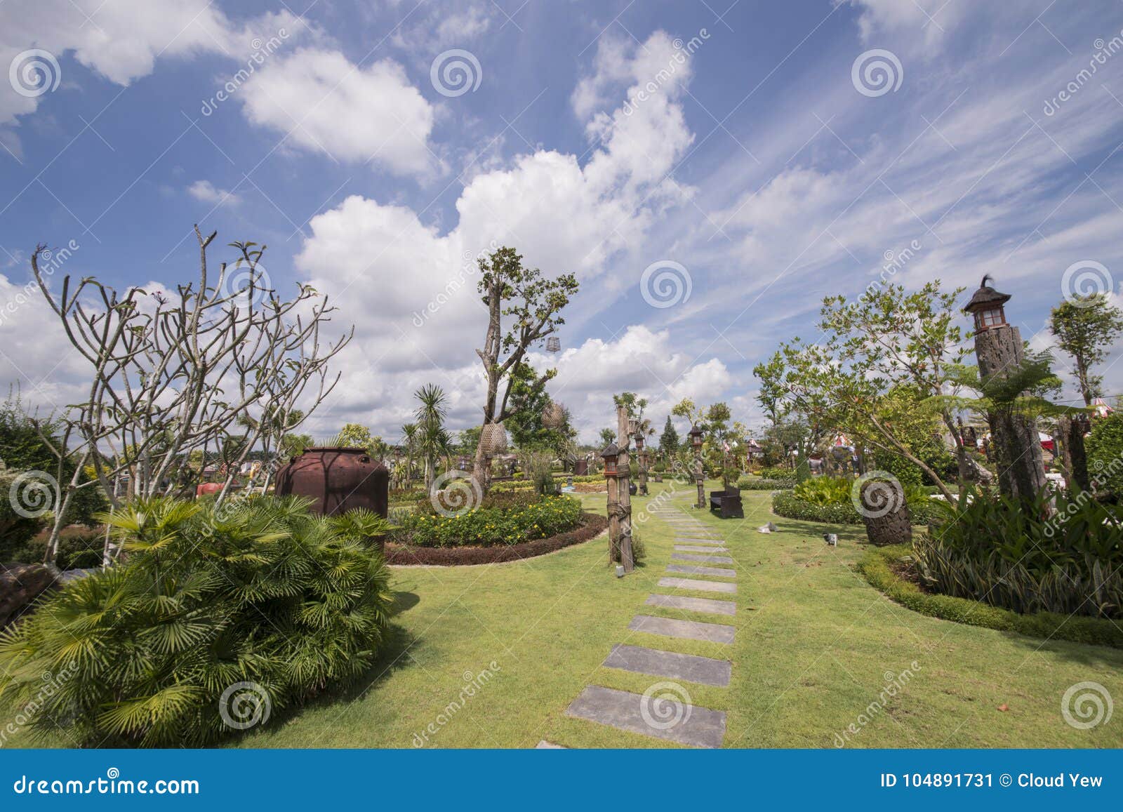 Garden with blue sky. stock image. Image of path, backyard 104891731